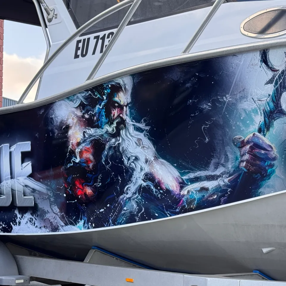 Poseidon holding a trident beside All Torque lettering on the Razerline Olympian hull
