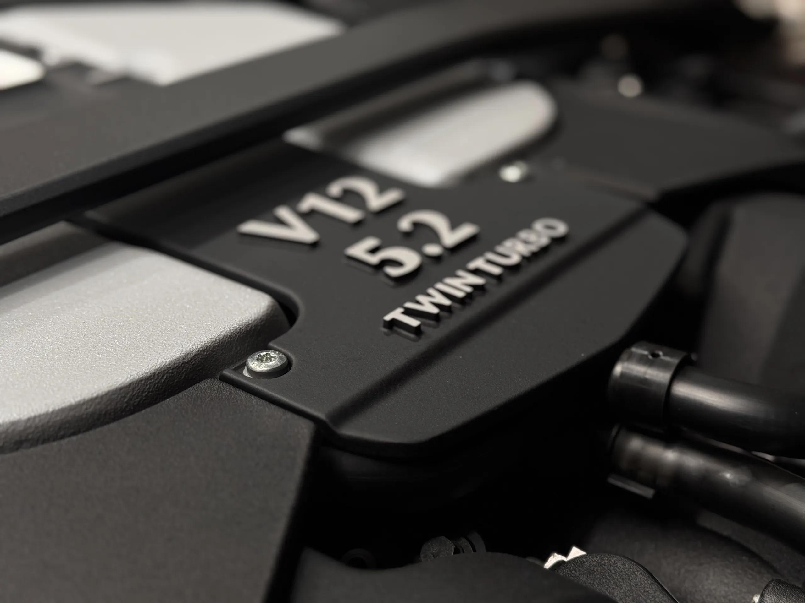V12 5.2 Twin Turbo lettering on the Aston Martin engine cover
