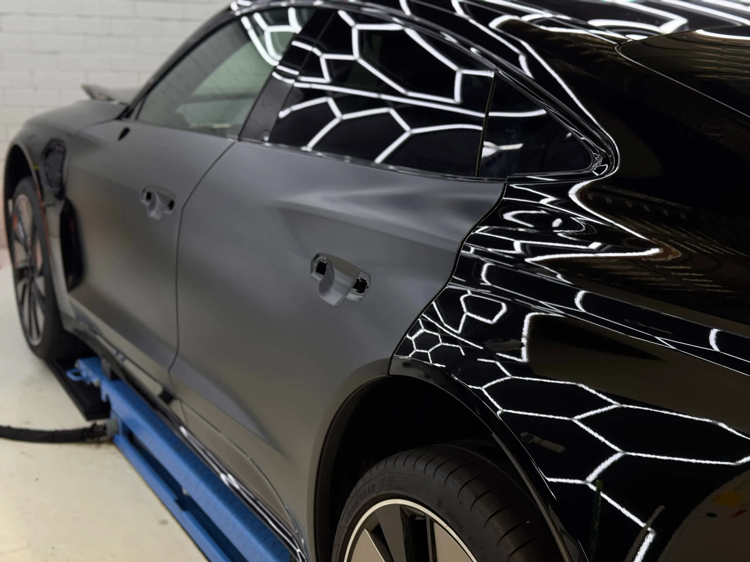Audi RS e-tron GT door and rear quarter with handles removed during film installation