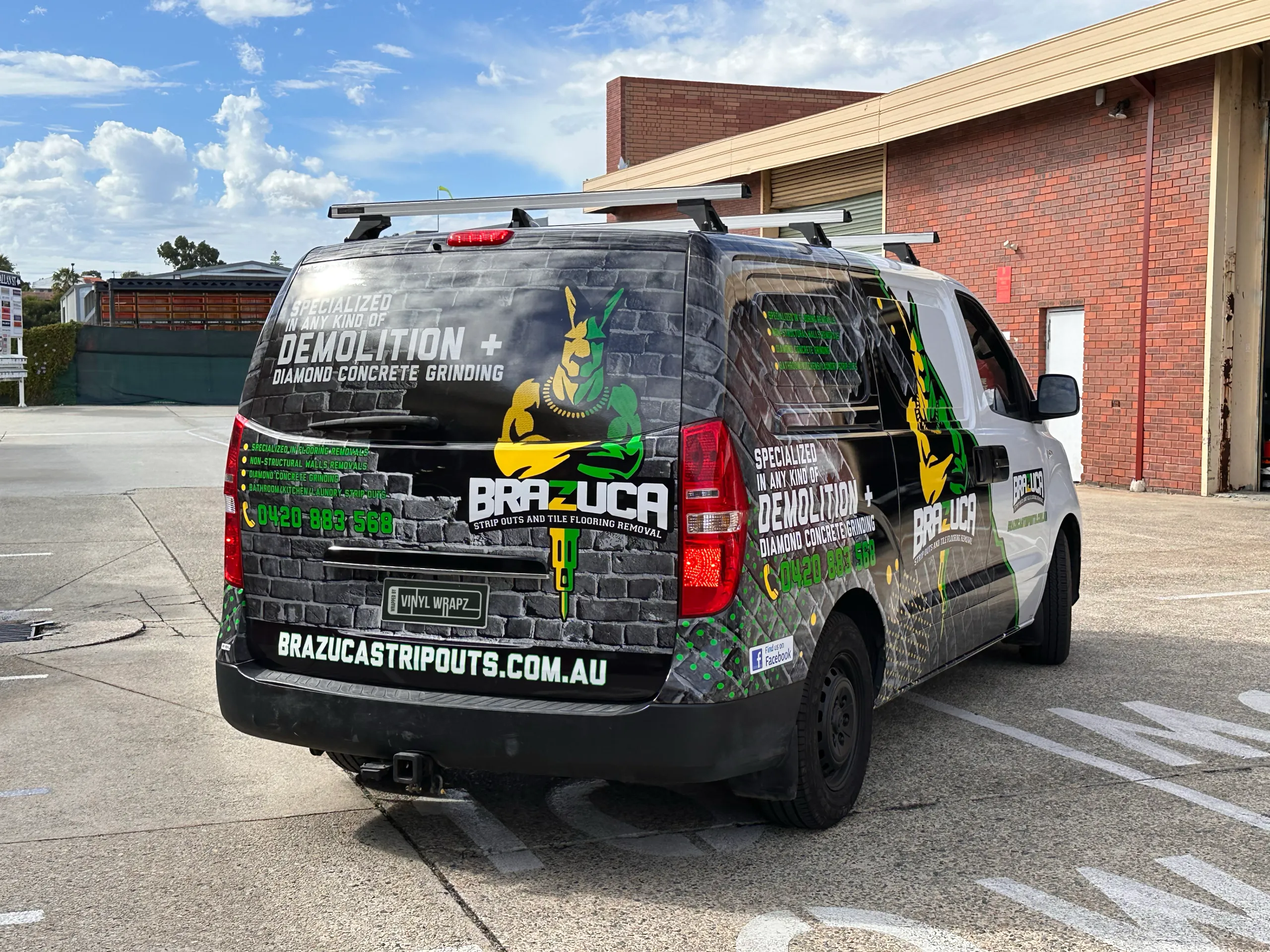 Brazuca branding and kangaroo artwork across the Hyundai iLoad rear hatch
