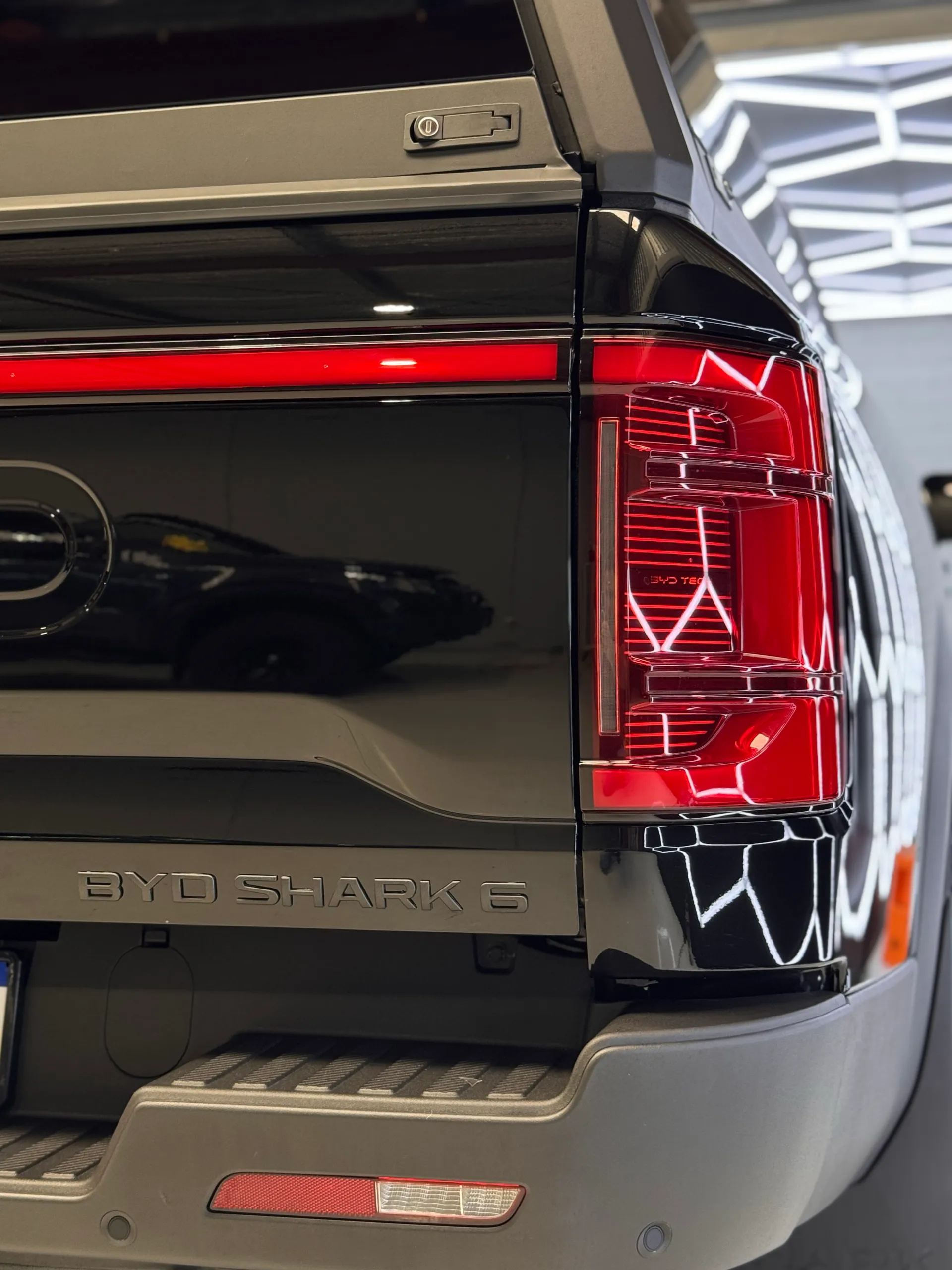 BYD Shark 6 tailgate badge, rear light and bumper in the workshop