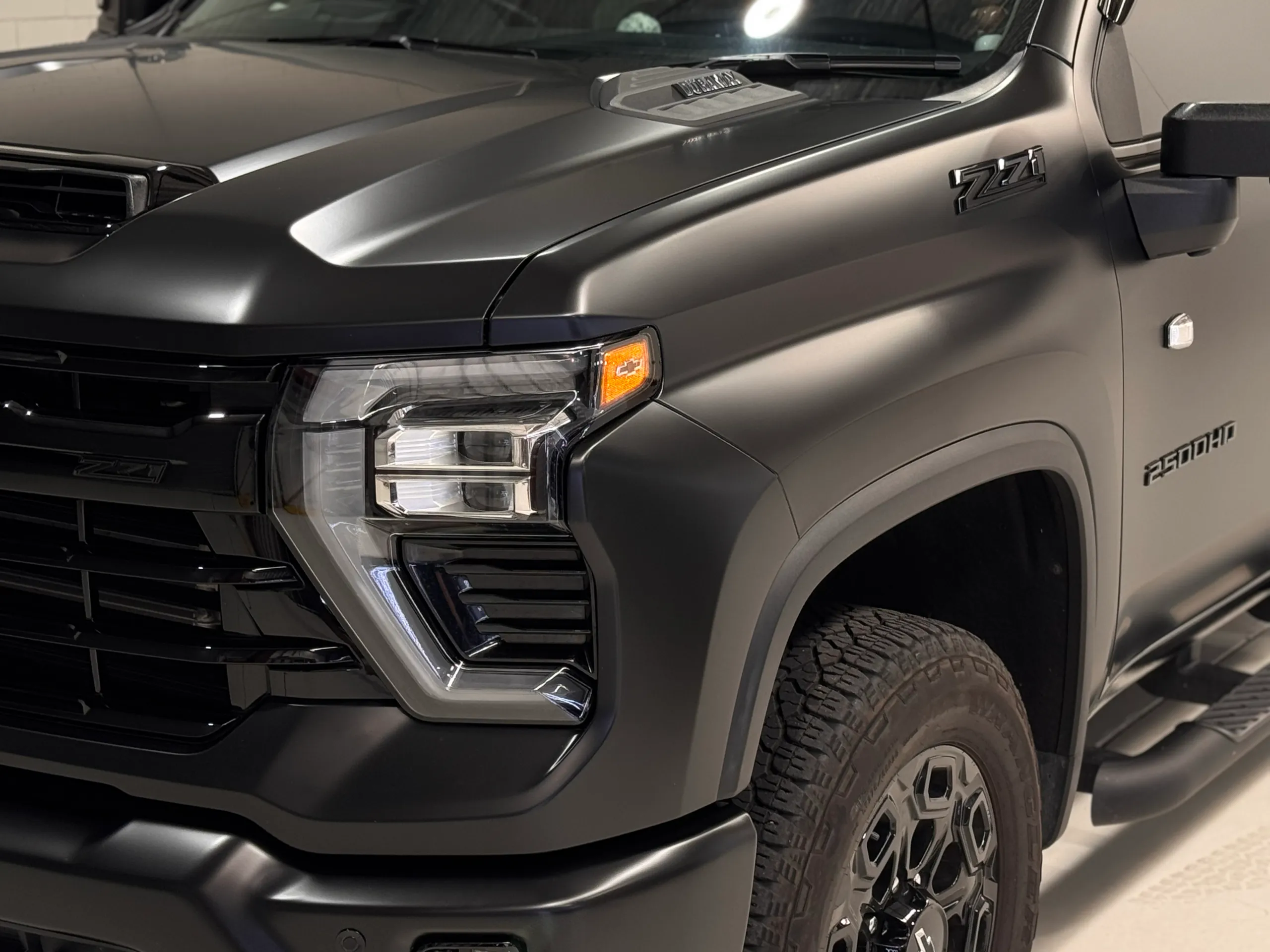 Matte dark grey Chevrolet Silverado front guard, Z71 badge and headlight