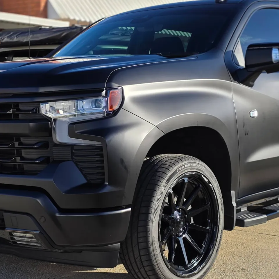 Chevrolet Silverado front quarter with a satin black finish outdoors