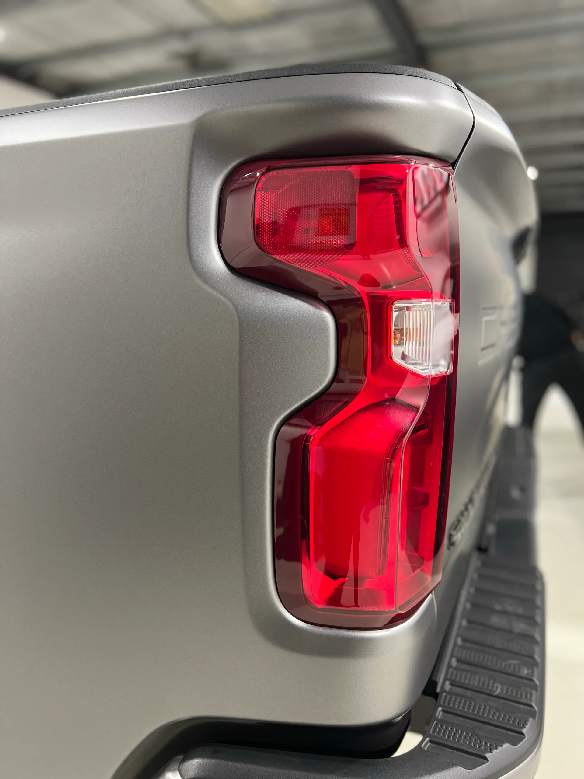 Matte anthracite Chevrolet Silverado rear light and quarter-panel detail