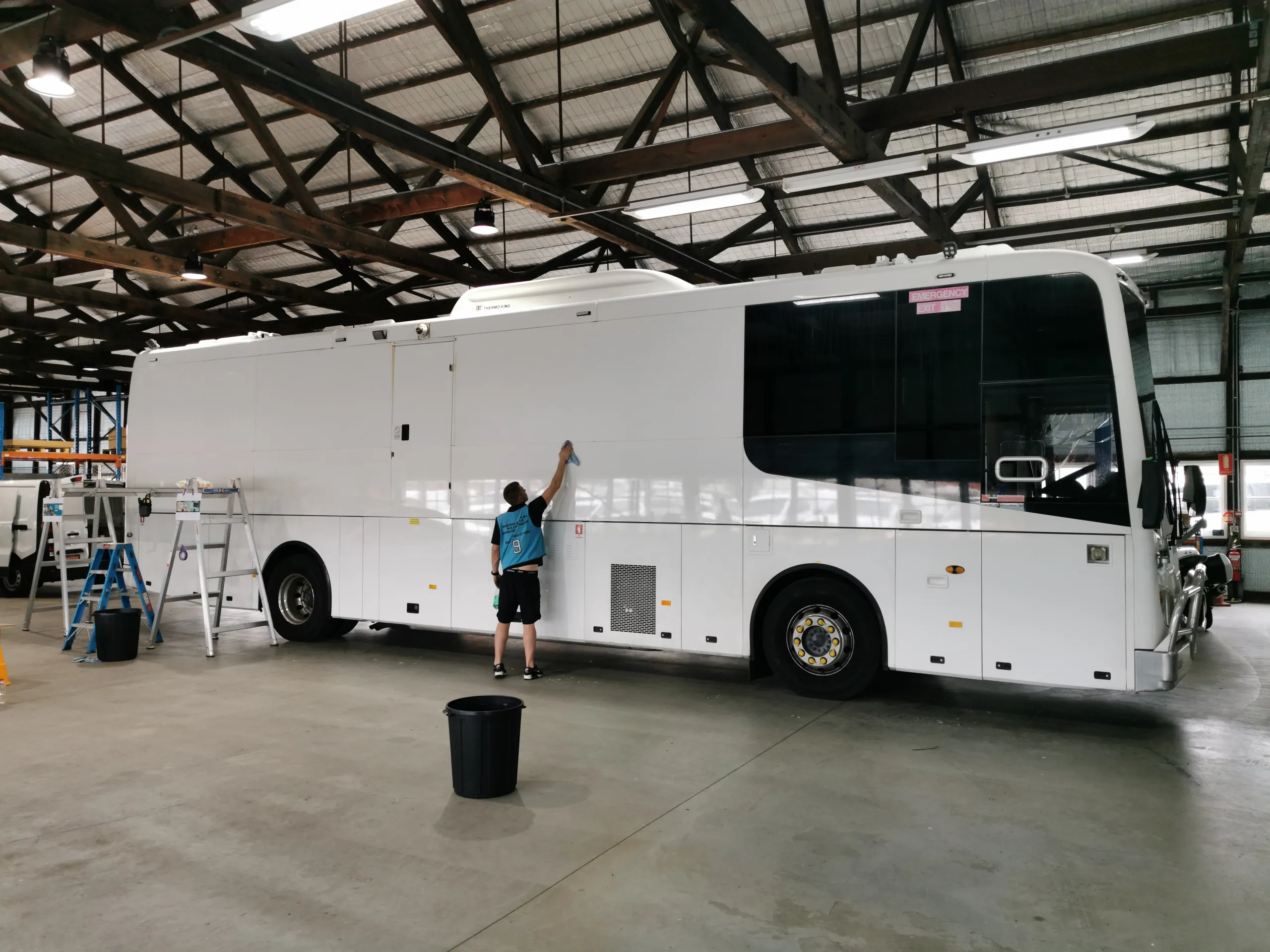 Wide view of coach preparation beside the workshop bench