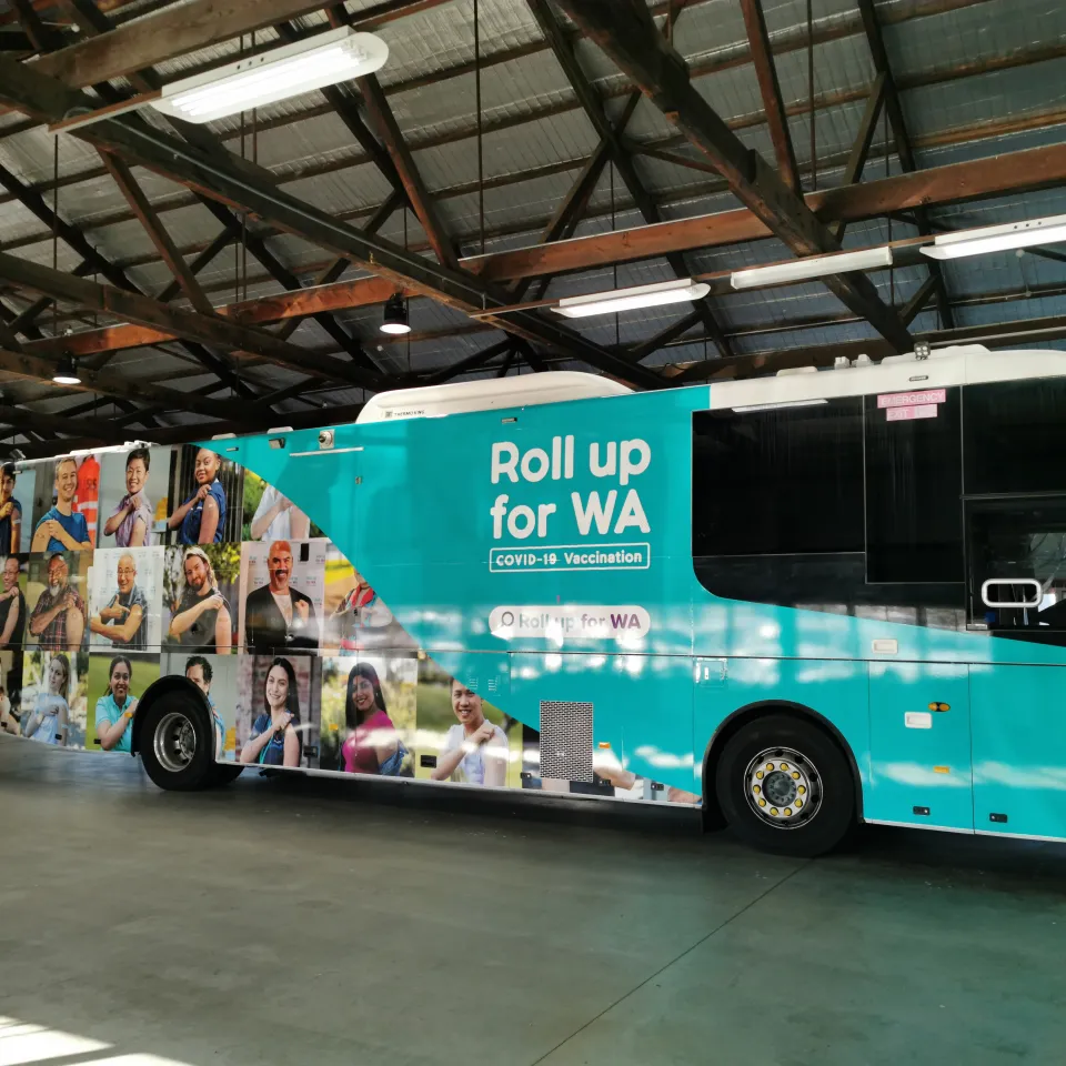 Completed vaccination coach with Roll Up for WA graphics
