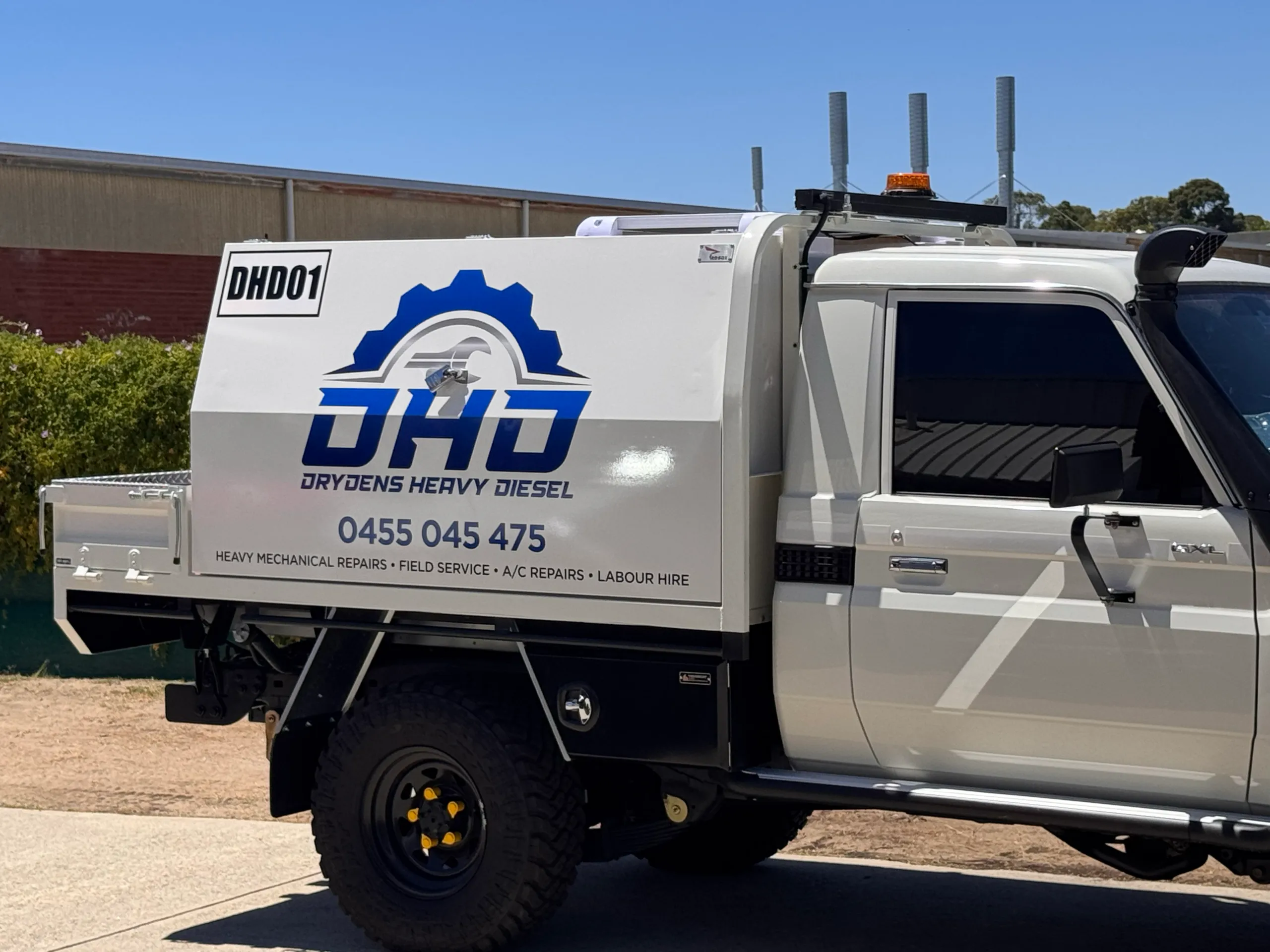 Drydens Heavy Diesel logo and contact lettering on the LandCruiser toolbox side