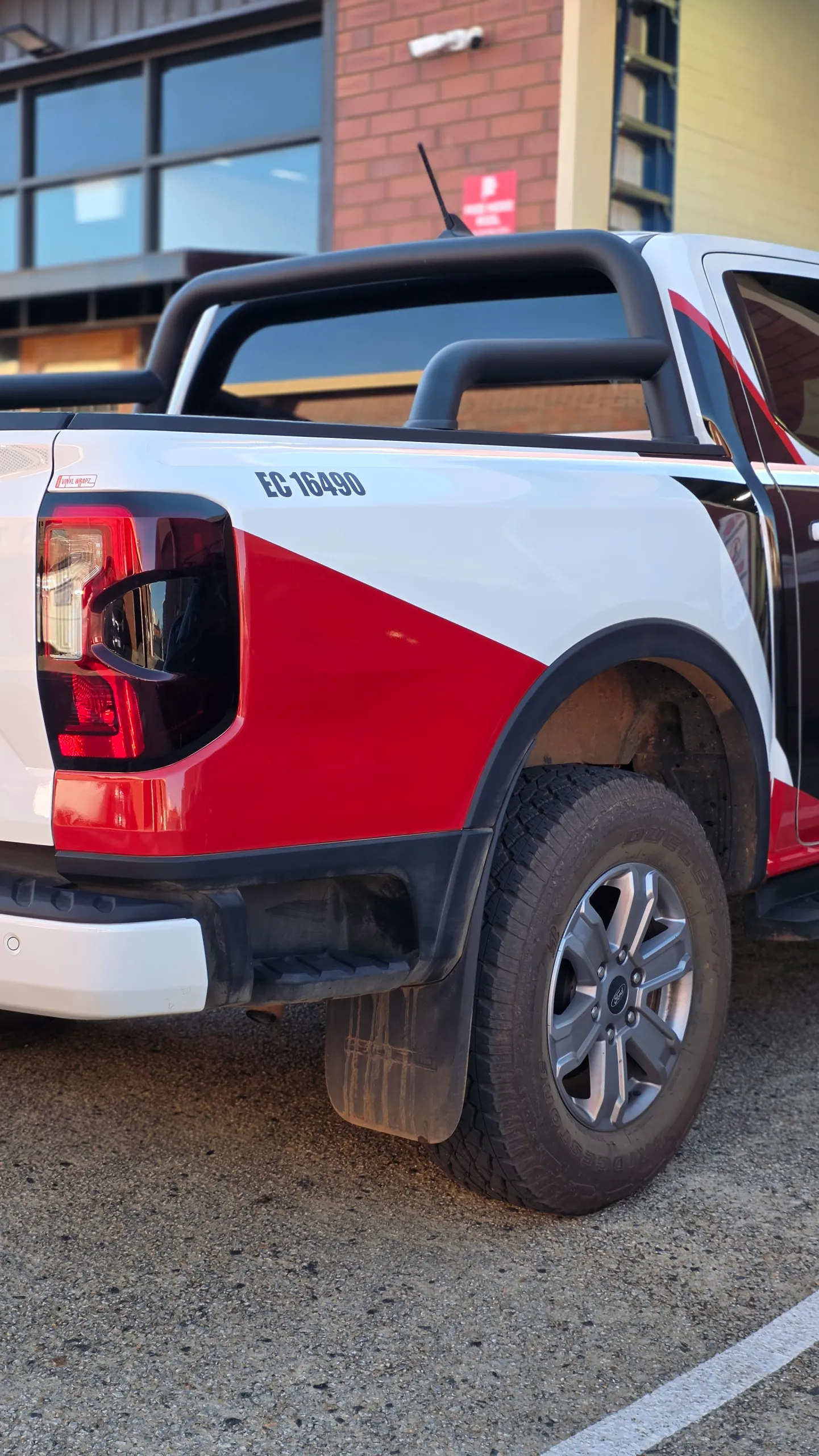Wind-turbine graphics and ESS lettering on the Ford Ranger rear quarter
