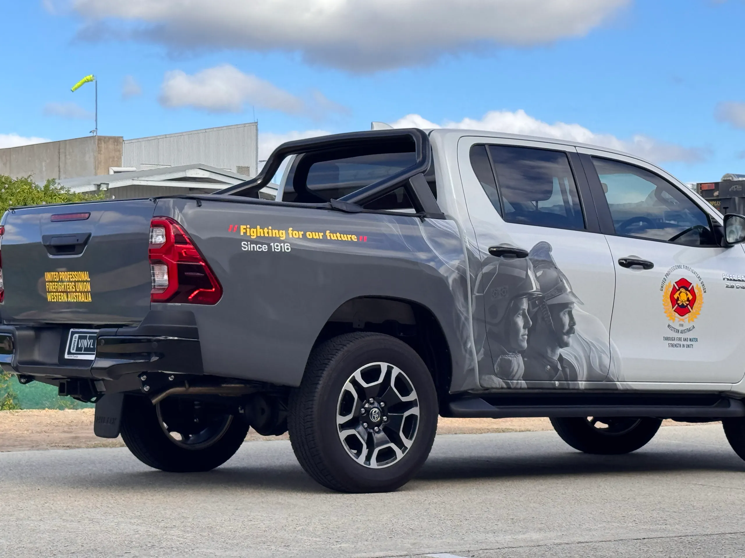 Firefighters Union Toyota Hilux tailgate and rear door with grey printed graphics