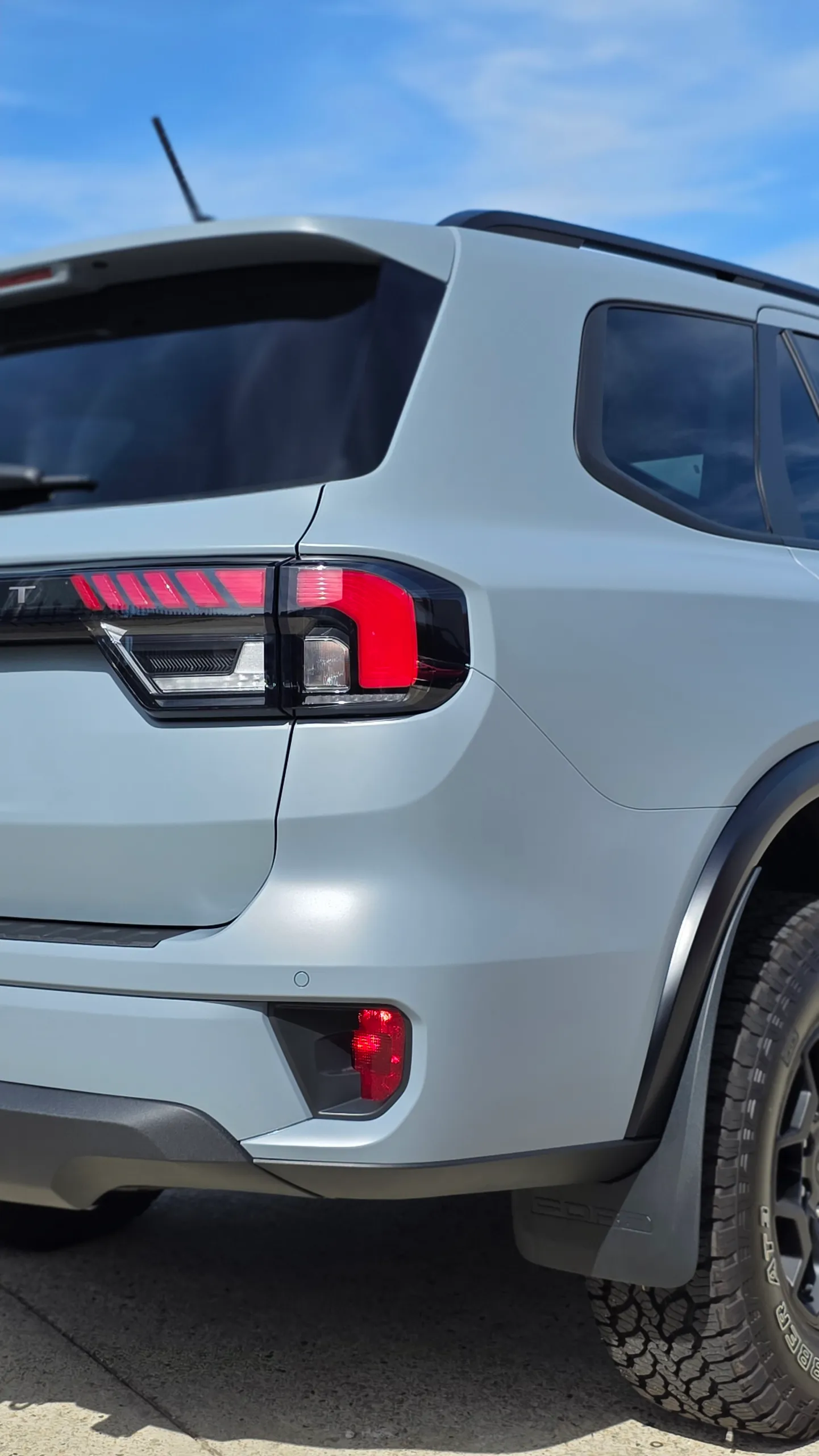 Ford Everest Tremor rear light and satin grey rear quarter outdoors