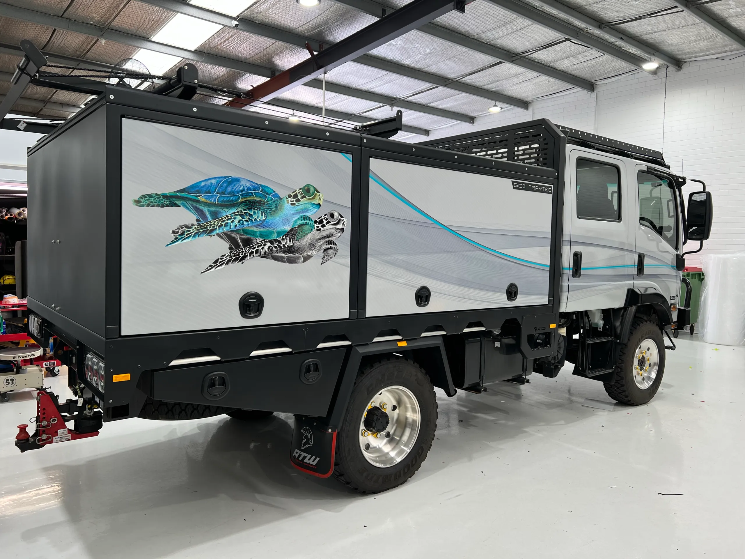 Turtle graphic on the opposite side of the completed camper