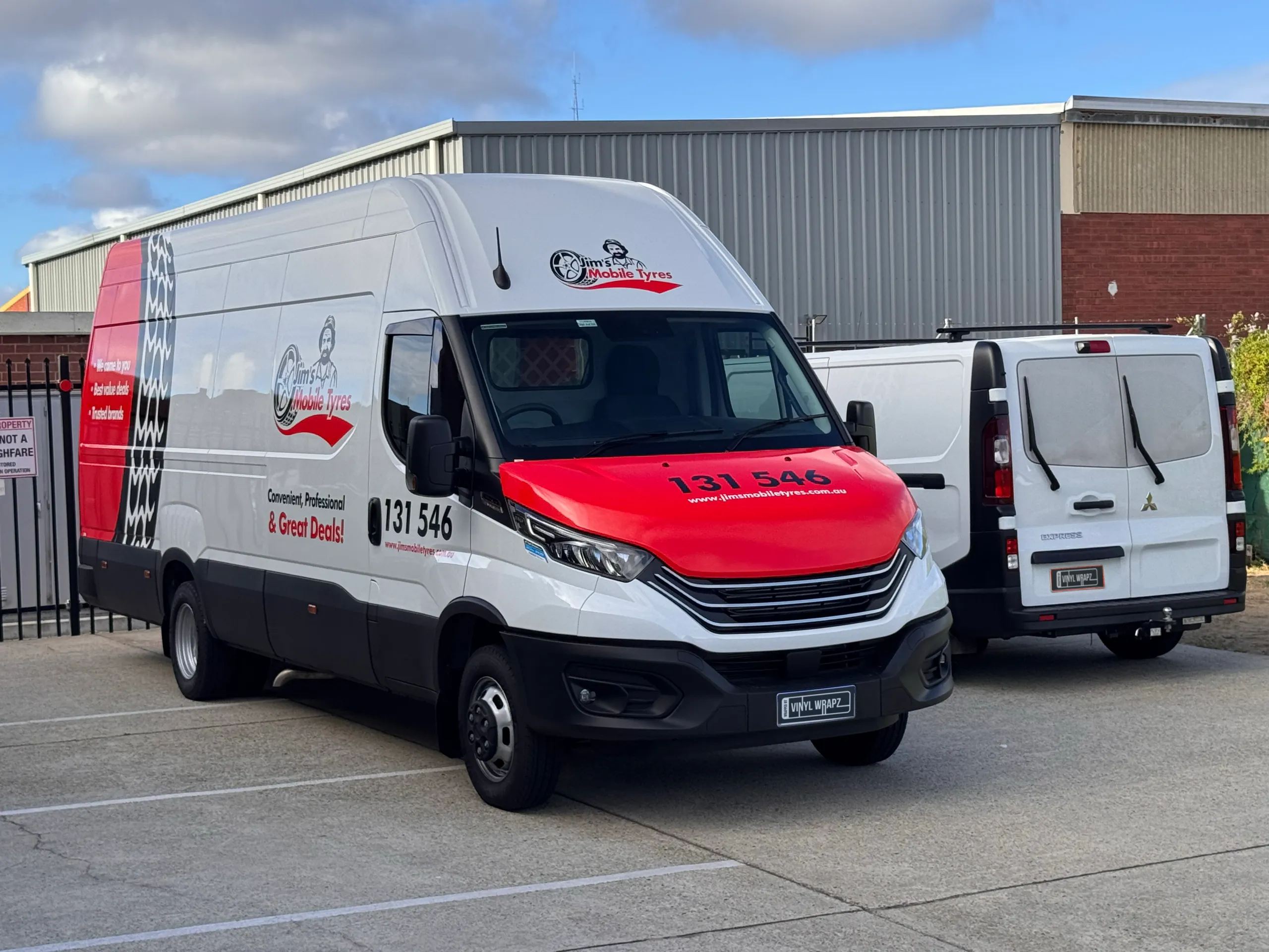 Jim's Mobile Tyres Iveco Daily viewed from the front quarter with its red branded bonnet