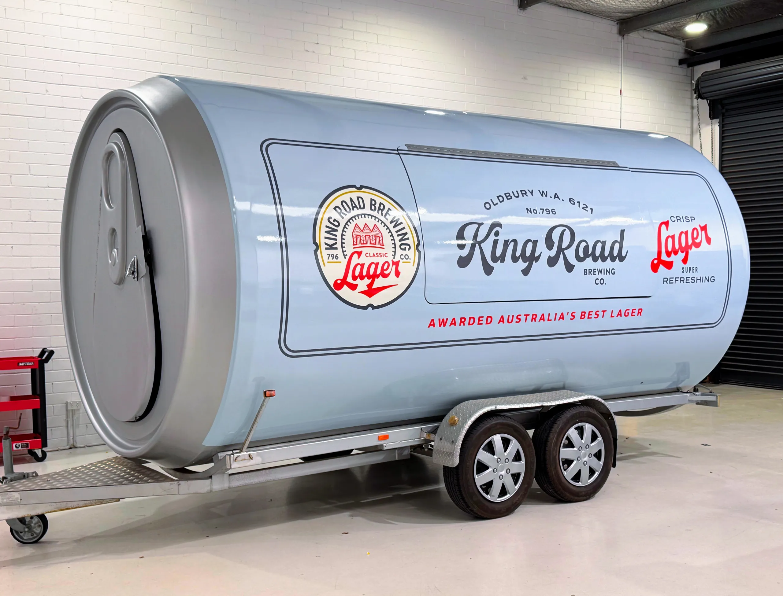 King Road Lager can trailer showing its branded serving hatch and silver can end