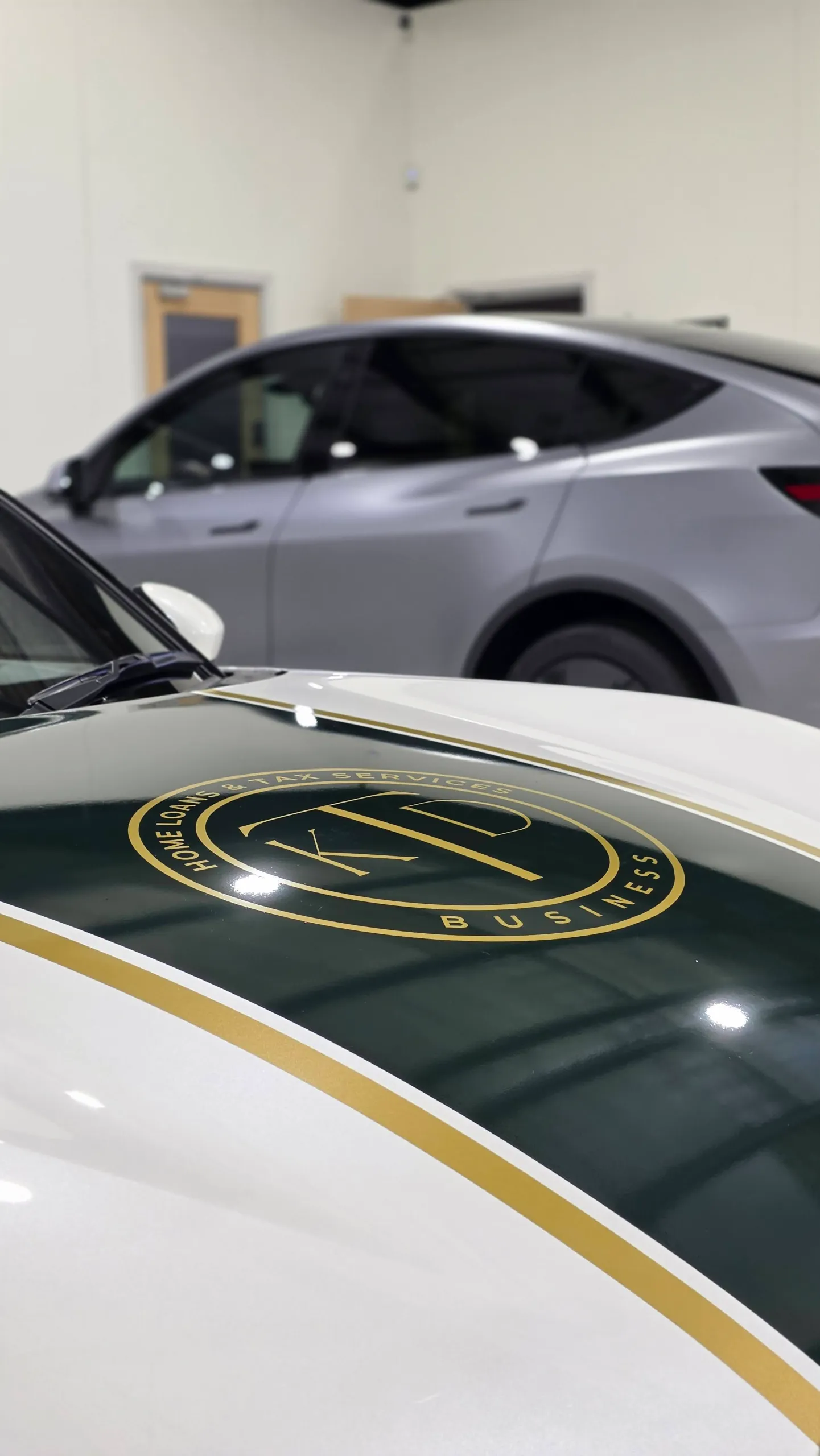 Green bonnet stripe with gold edging and the KTD logo on a white Mazda MX-5