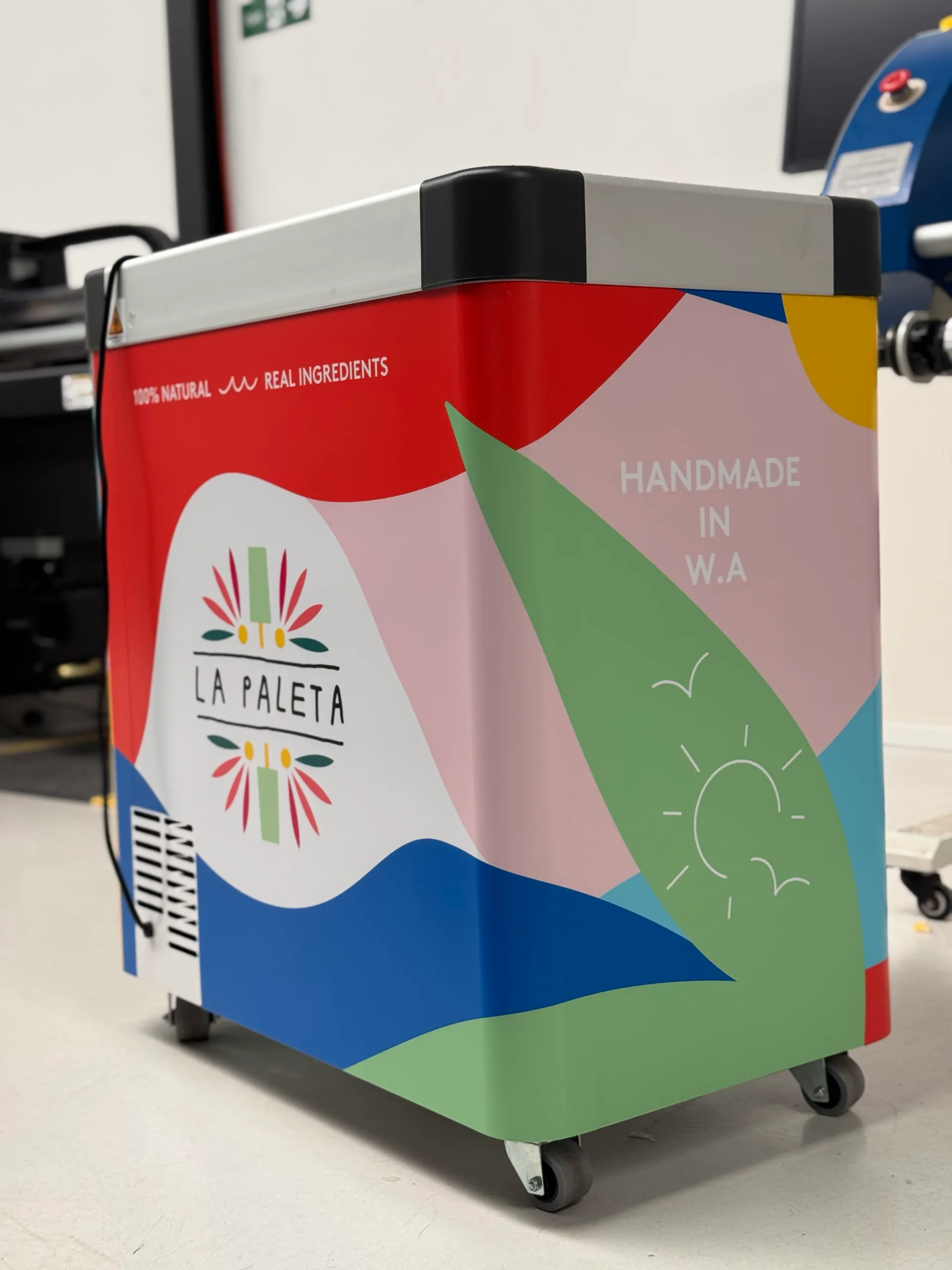 La Paleta freezer rear corner with colourful graphics and Handmade in W.A. lettering