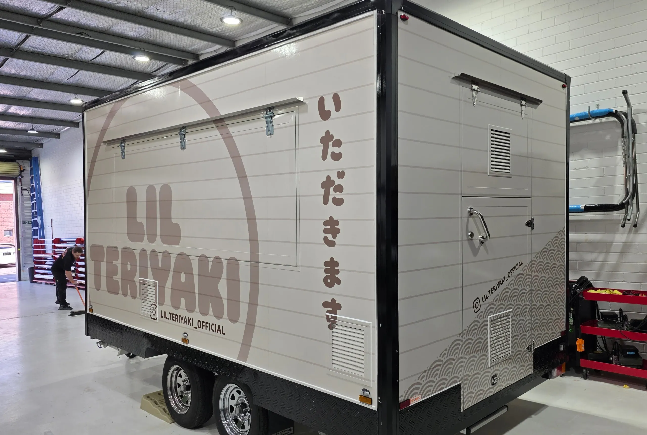 Lil Teriyaki food trailer side and rear door with cream and brown graphics