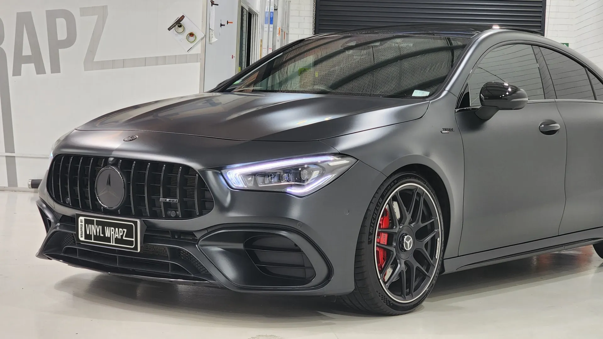 Mercedes-AMG CLA 45 S bonnet, grille and front wheel with satin dark grey bodywork