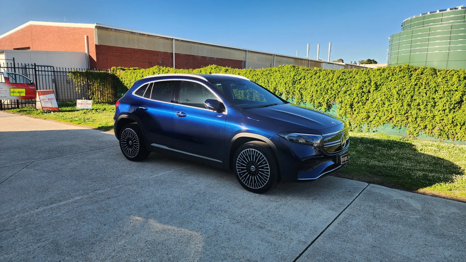 Mercedes-Benz EQA in a blue-black iridescent colour change wrap