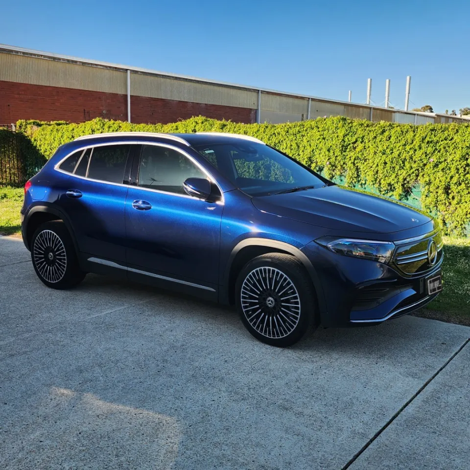 Blue and black iridescent Mercedes-Benz EQA, front quarter