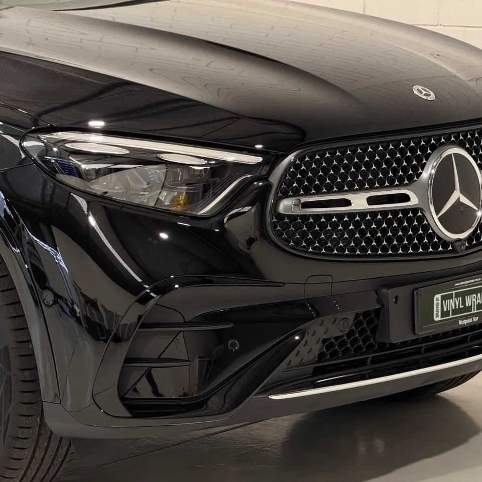 Gloss black Mercedes-Benz GLC 300 grille, headlight and front bumper in the workshop