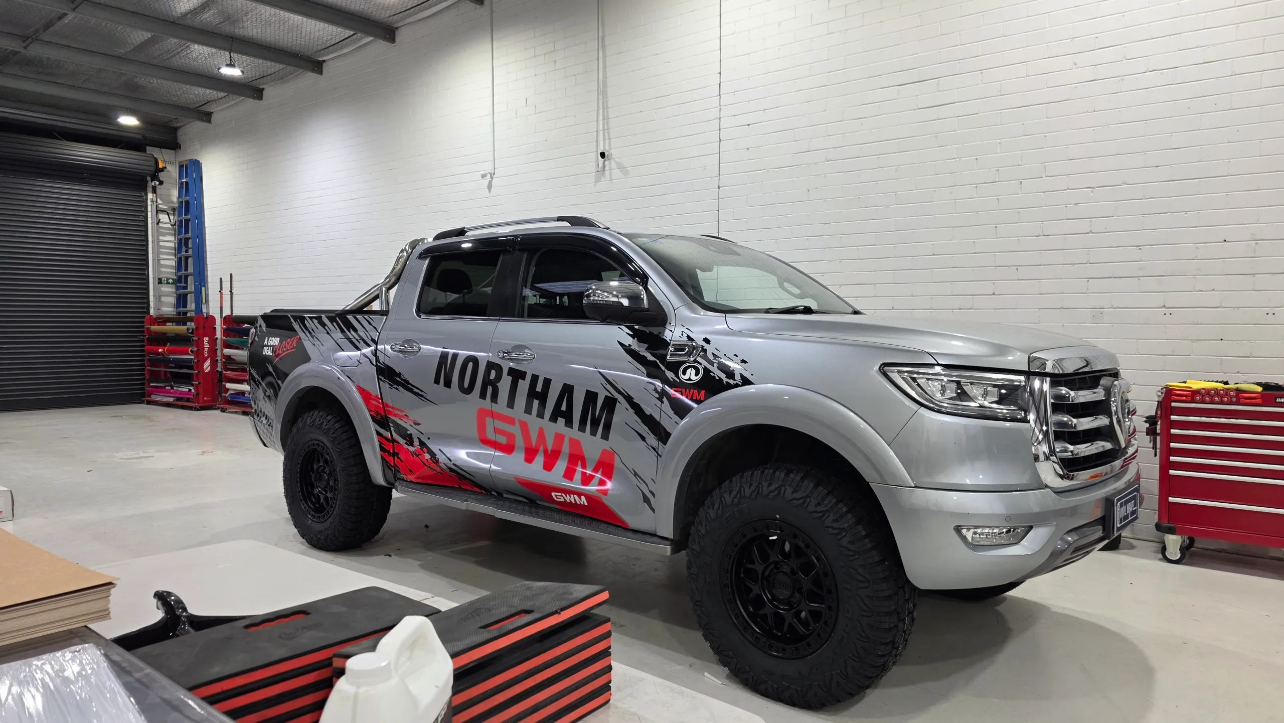 Silver GWM Cannon with black and red Northam GWM graphics, viewed from the front quarter