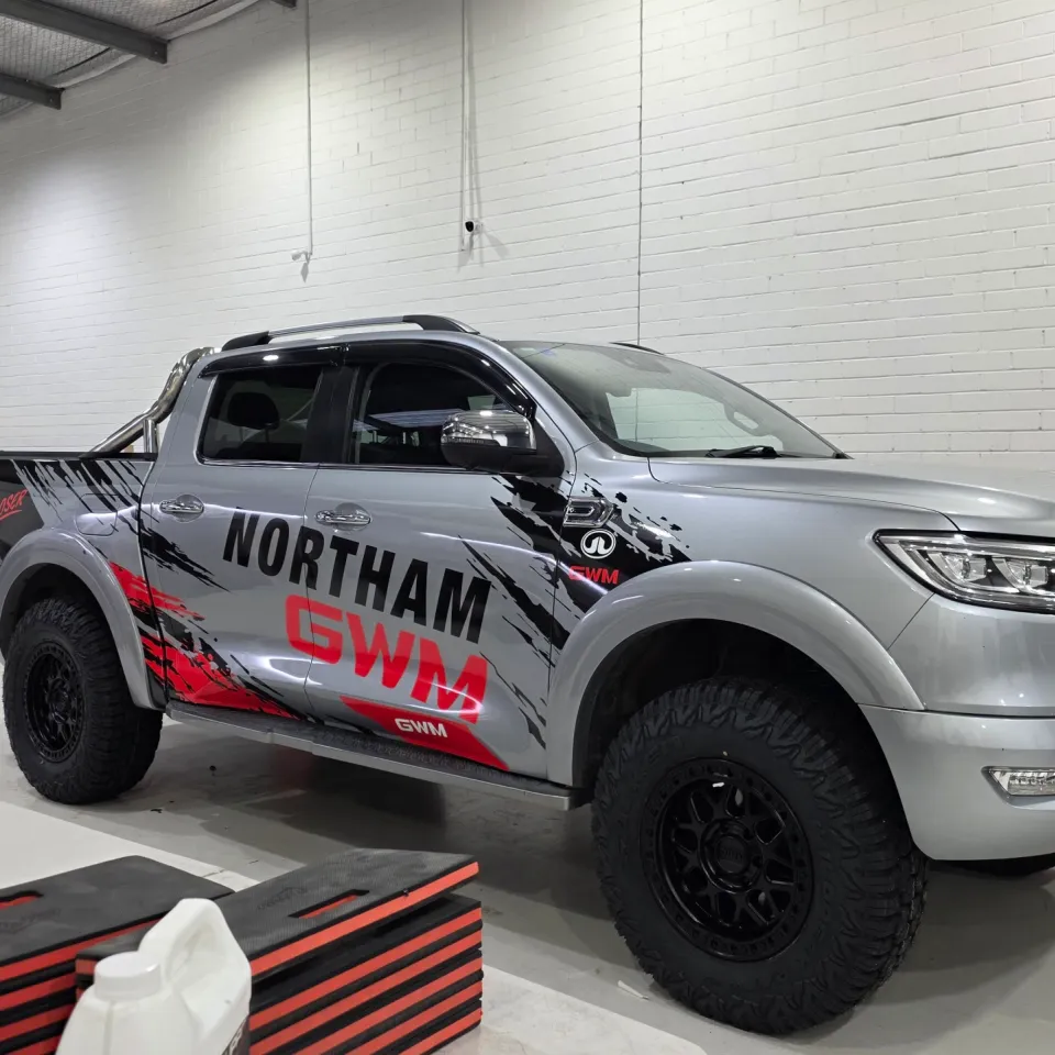 Silver GWM Cannon with black and red Northam GWM graphics, viewed from the front quarter