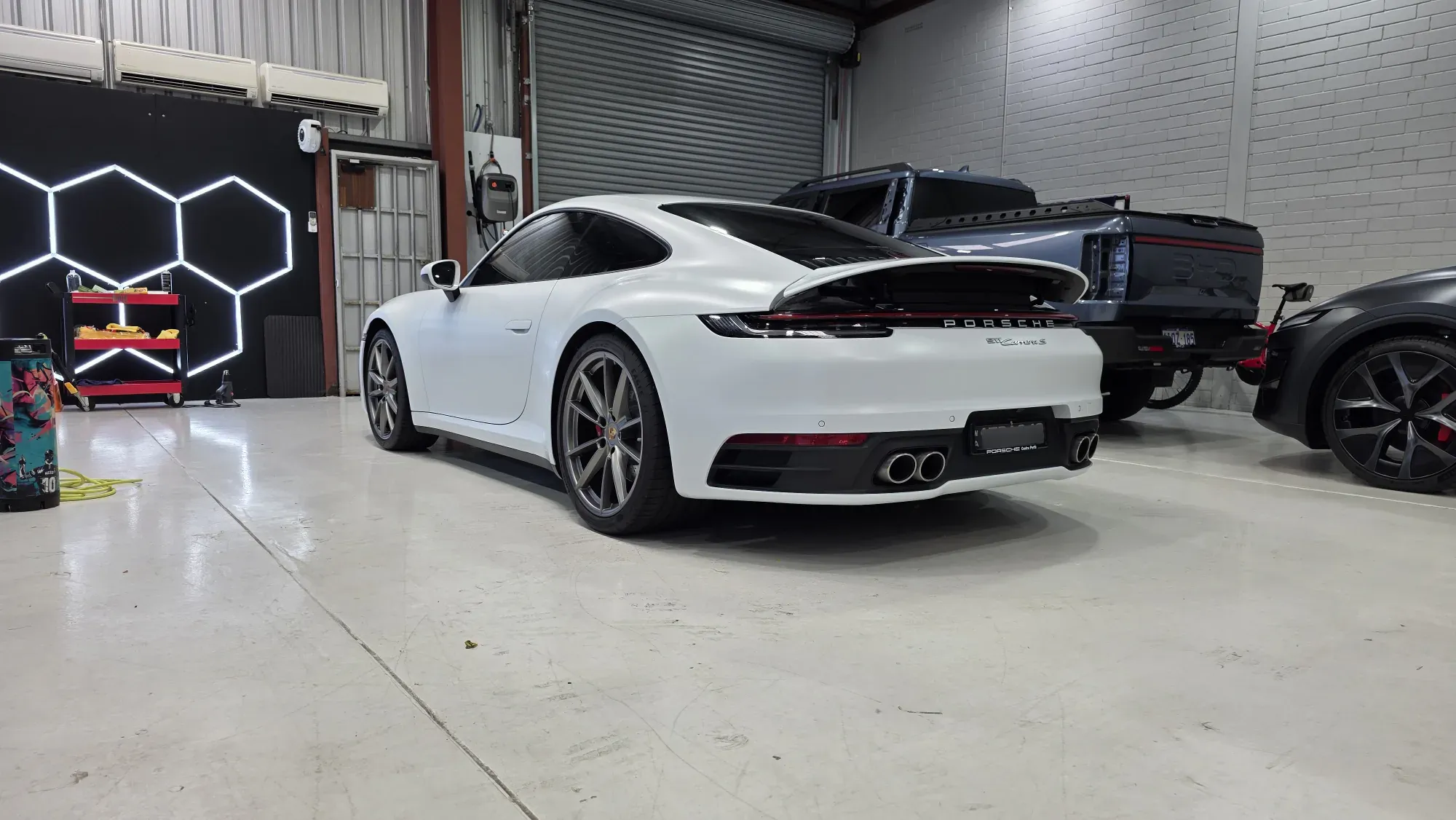 Porsche 911 Carrera S on the Vinyl Wrapz workshop floor in Osborne Park, in for paint protection film