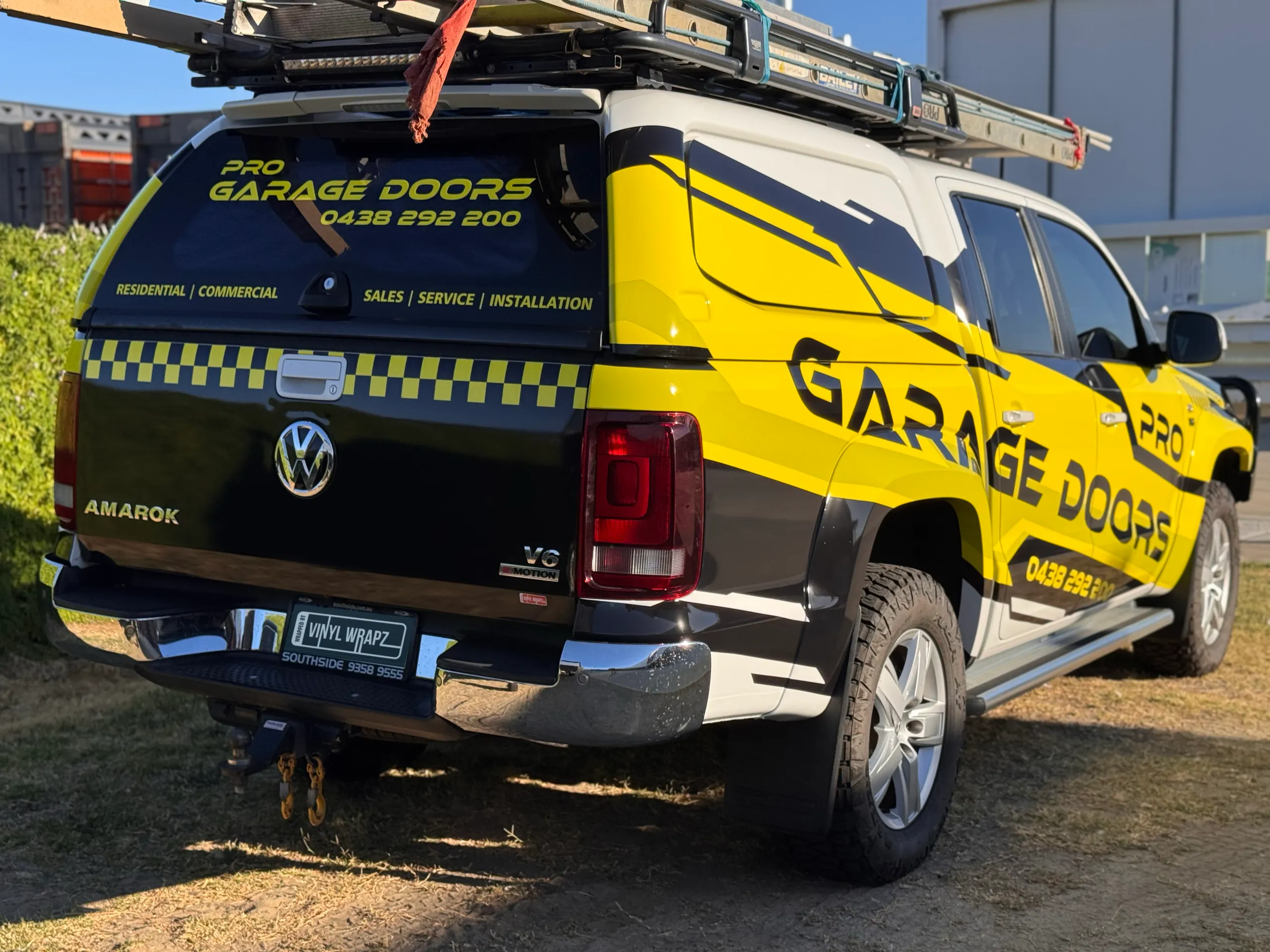 Pro Garage Doors branding across the Volkswagen Amarok tailgate and canopy