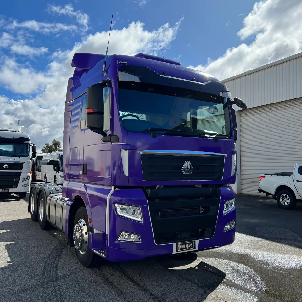 Completed purple Instruckta truck outside the workshop