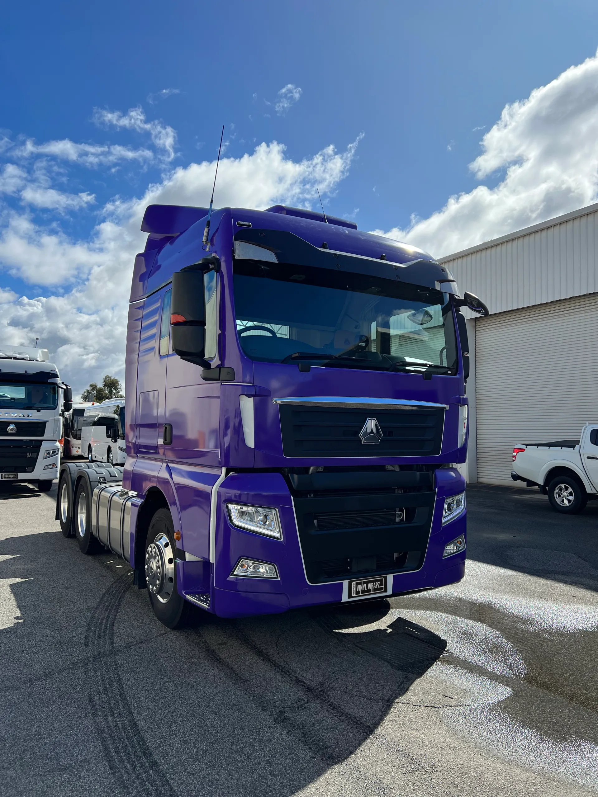 Completed purple Instruckta truck outside the workshop