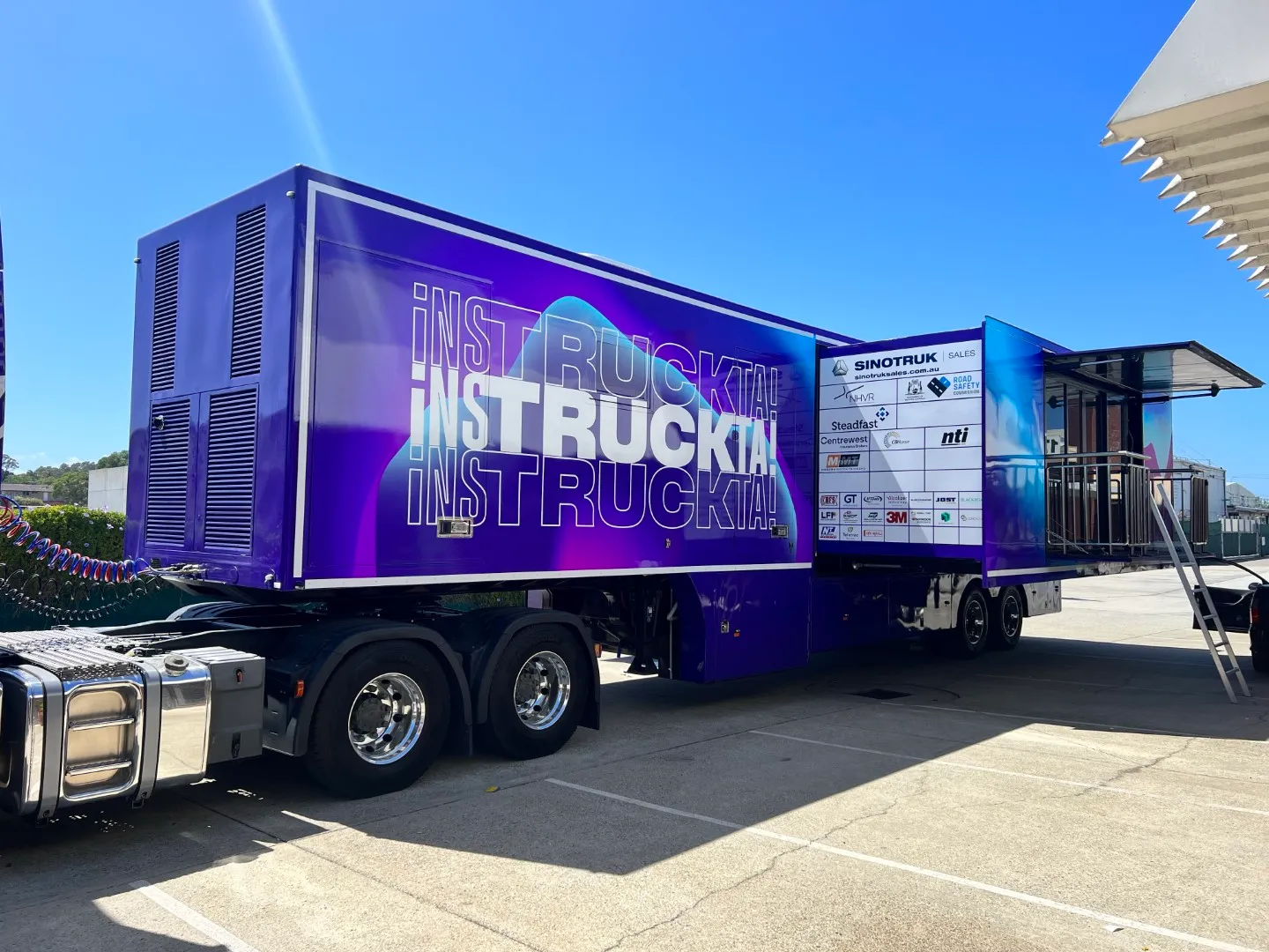 Instruckta trailer side graphics and entry steps