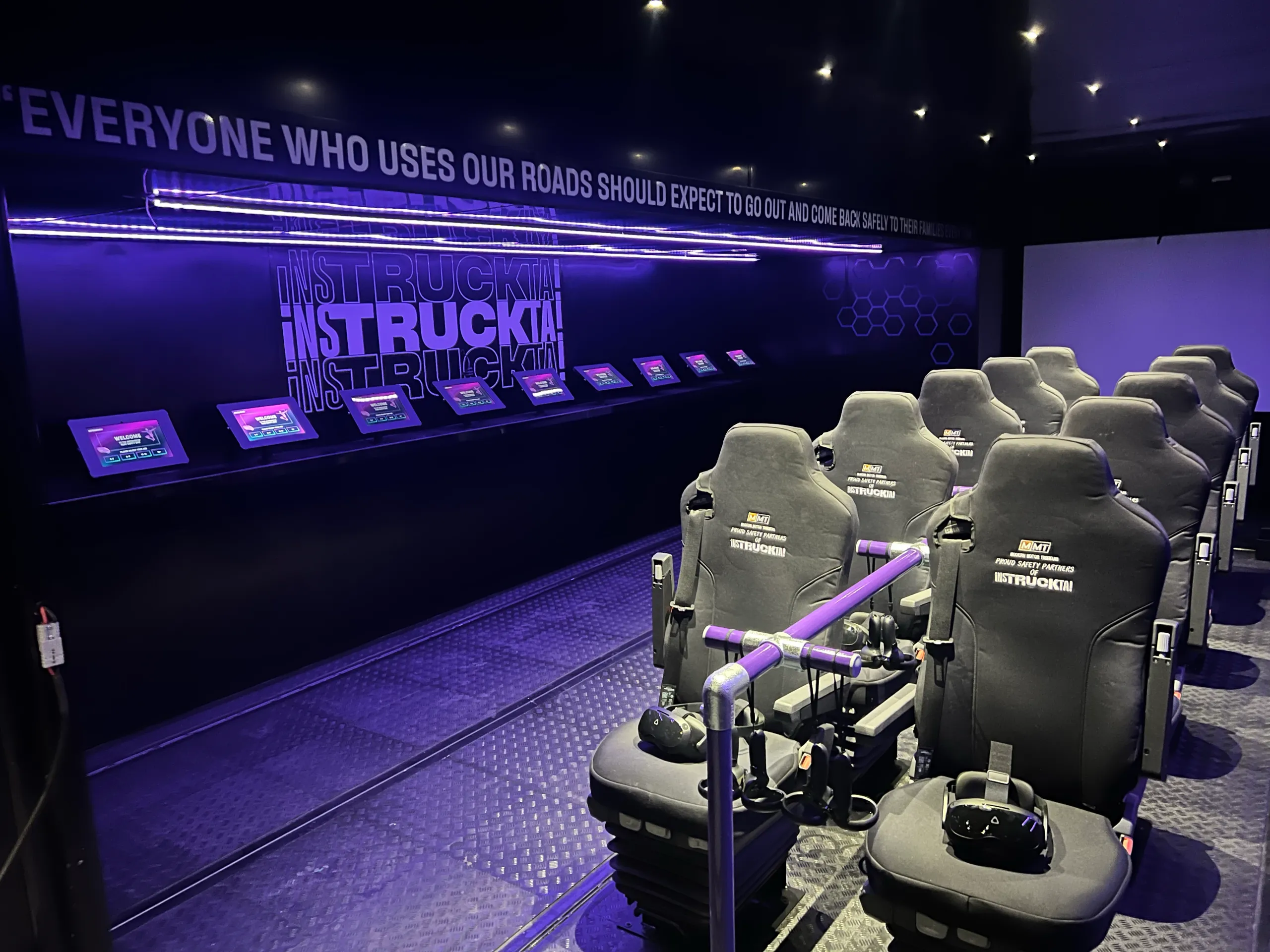 Seating and display area inside the exhibition trailer