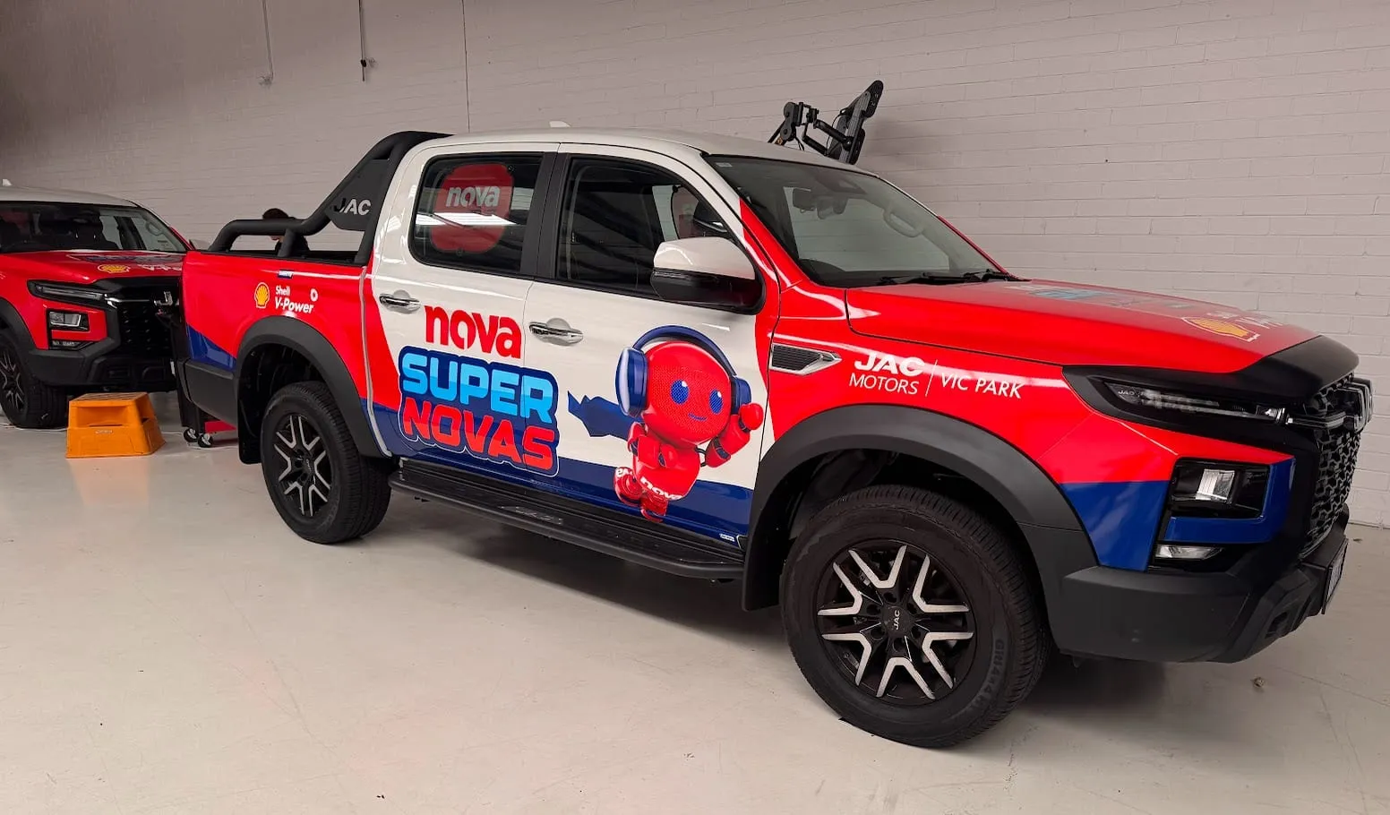 Nova 93.7 promotional ute in the station's red printed wrap by Vinyl Wrapz