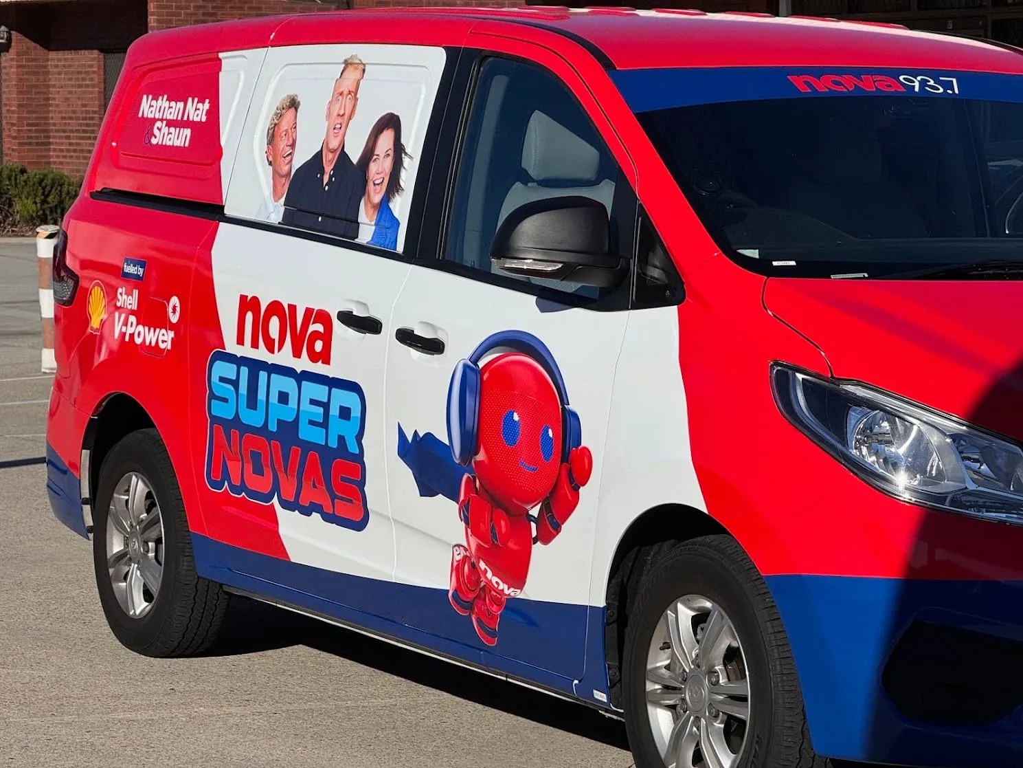 Nova 93.7 promotional van in a red and white printed wrap with the Super Novas artwork
