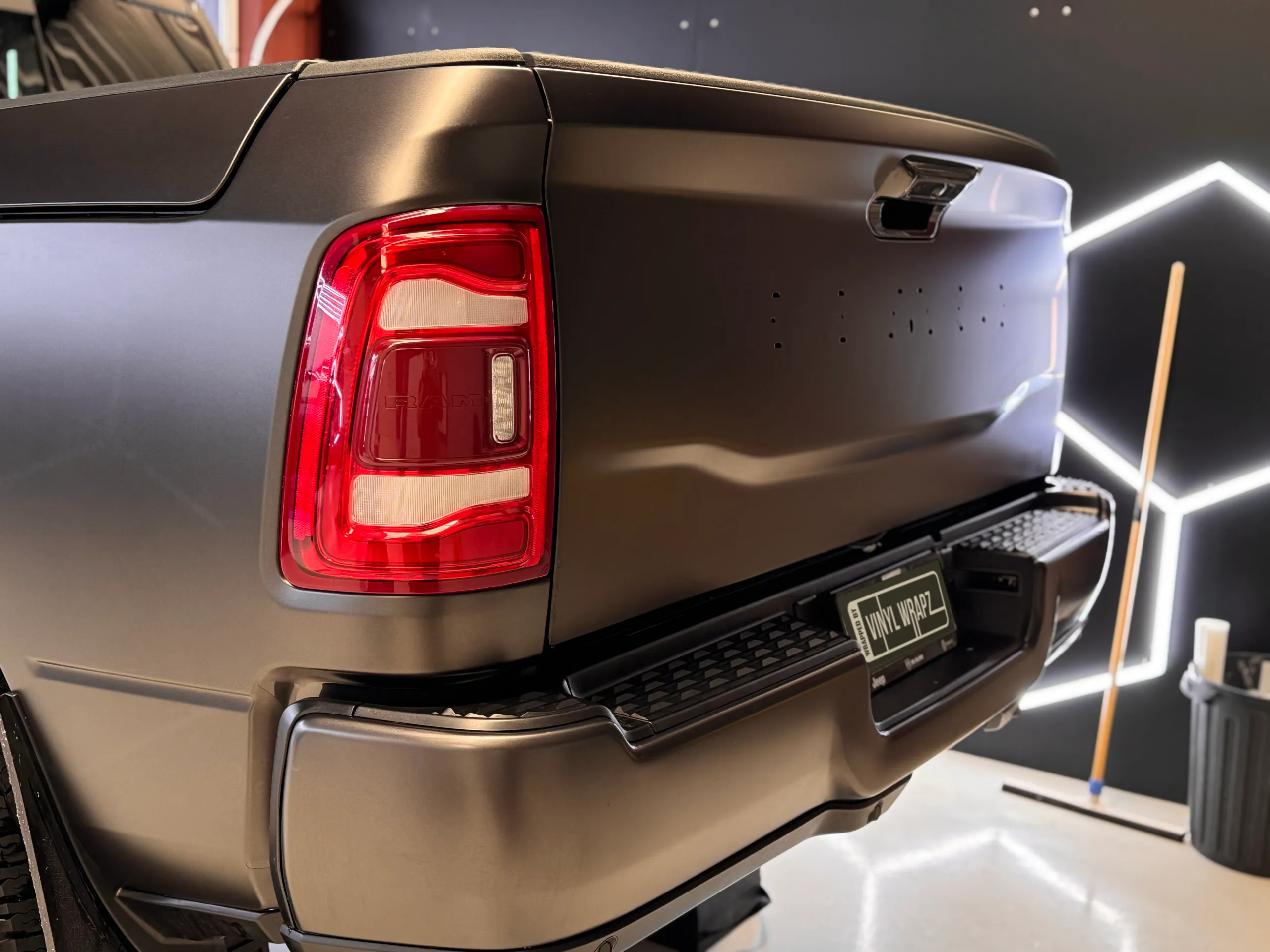 Ram rear light, tailgate and bumper with a satin dark grey finish and badges removed