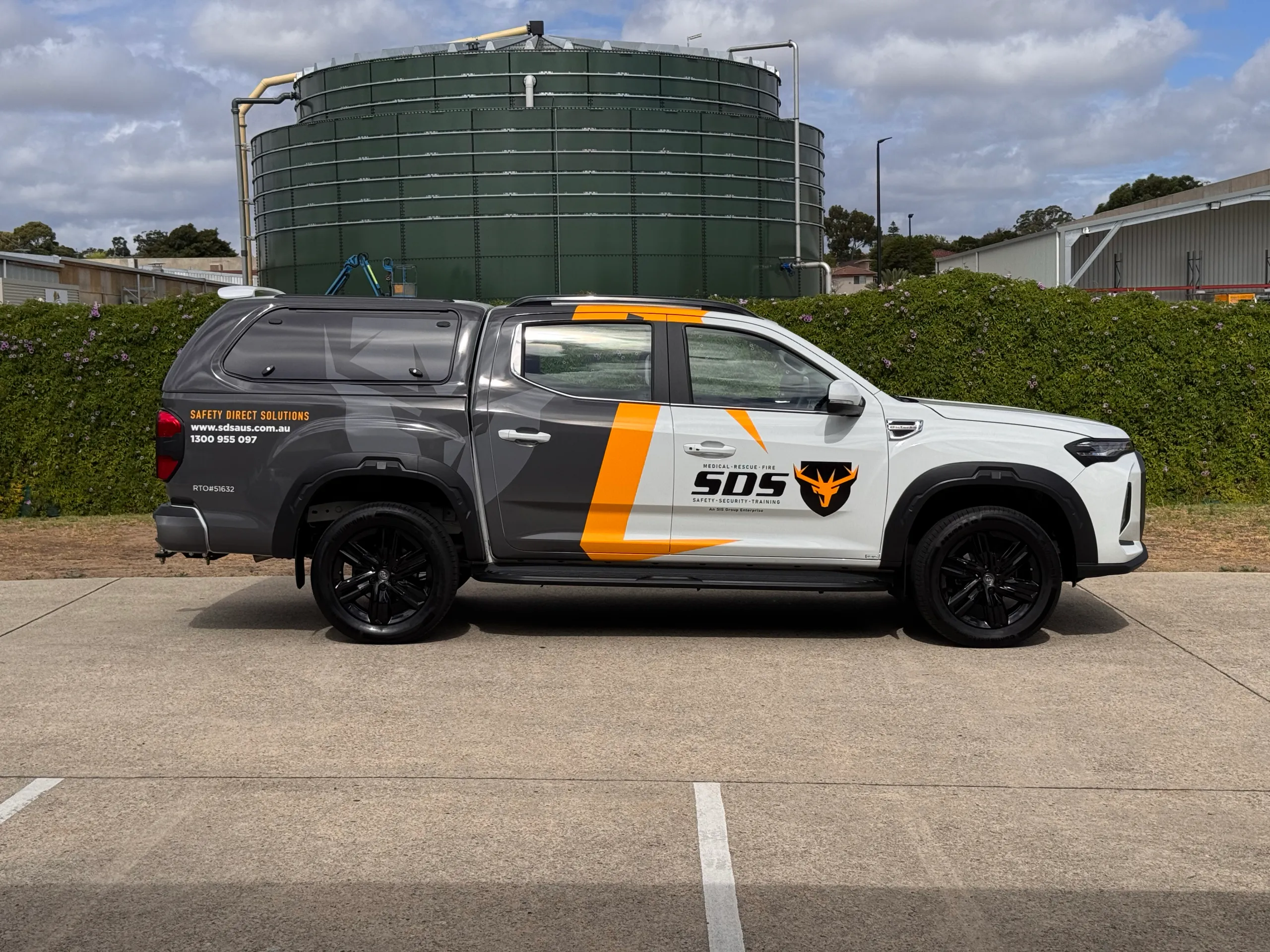 Safety Direct Solutions LDV ute with grey canopy graphics and yellow door accents