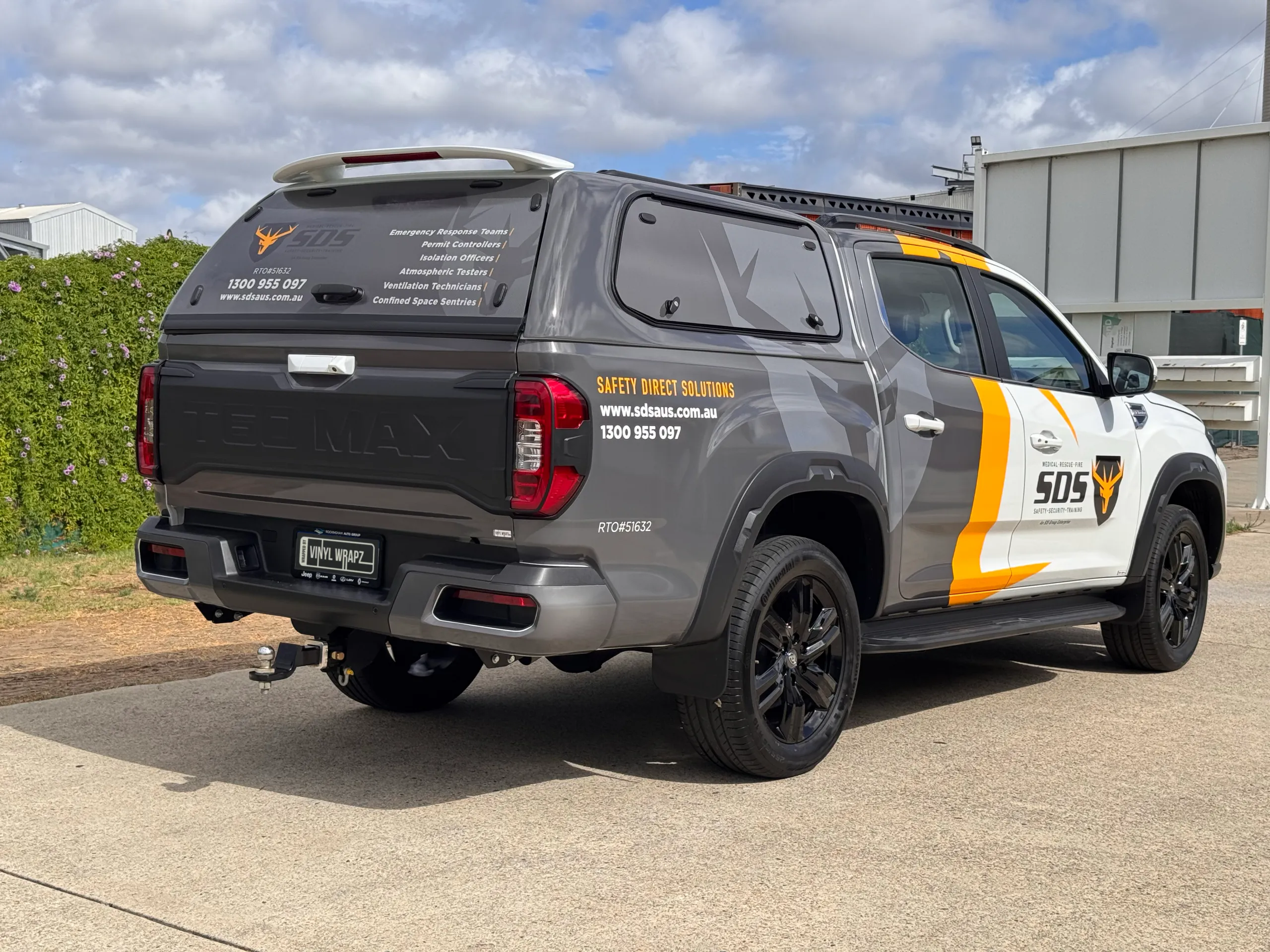 Grey Safety Direct Solutions canopy and tailgate graphics on the LDV T60 MAX