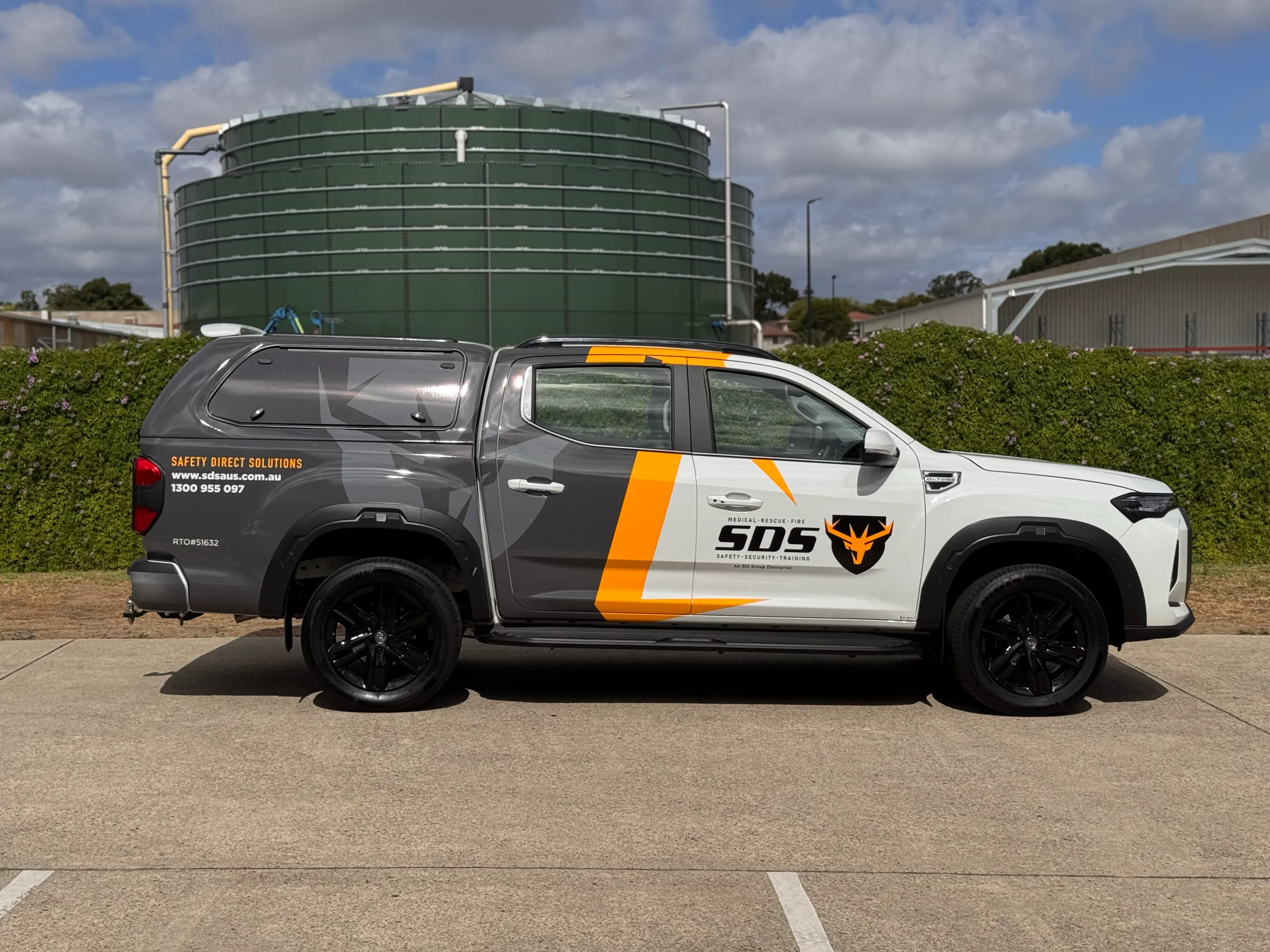 Side view of the Safety Direct Solutions LDV ute and enclosed canopy
