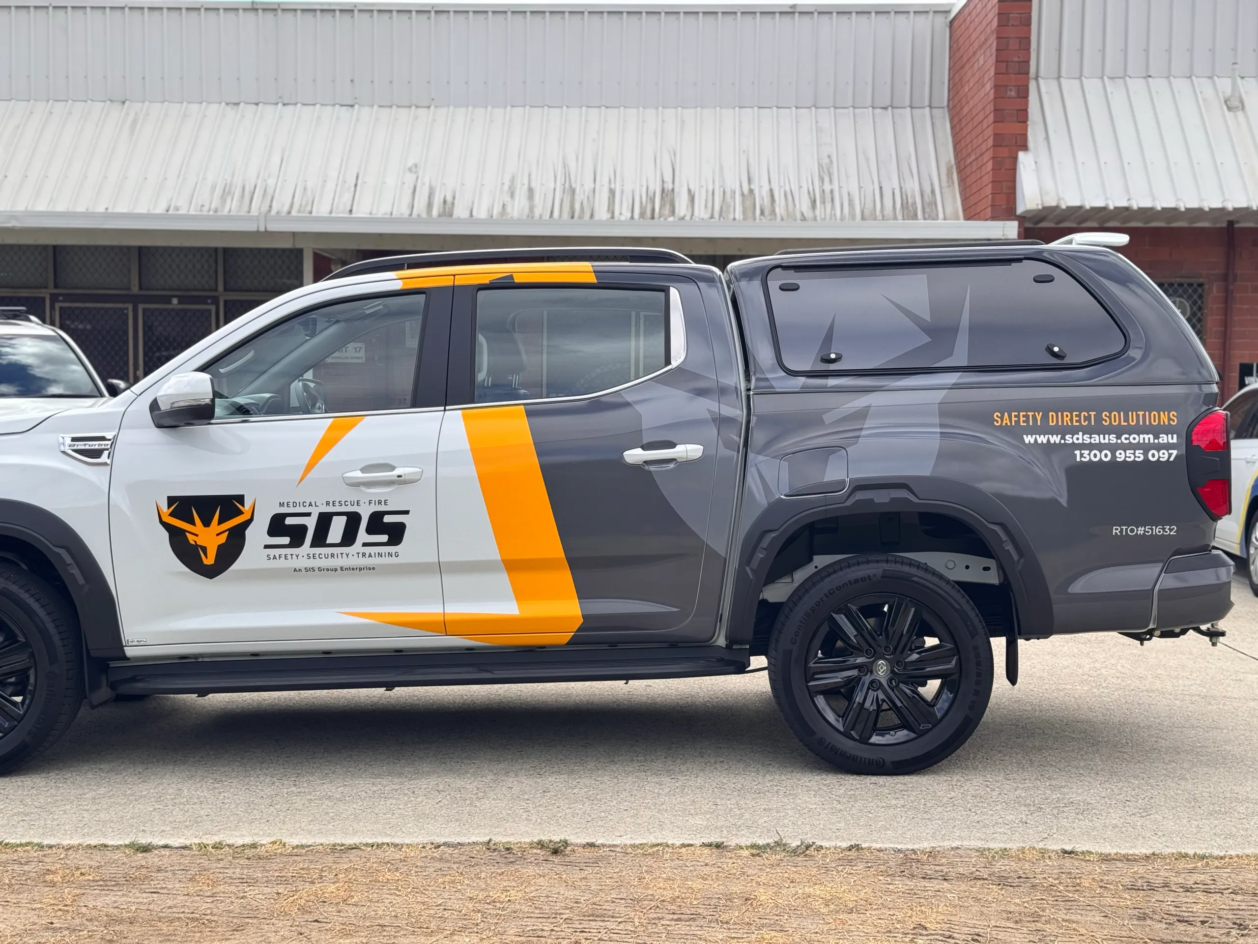 Grey SDS graphics along the LDV ute rear doors and canopy