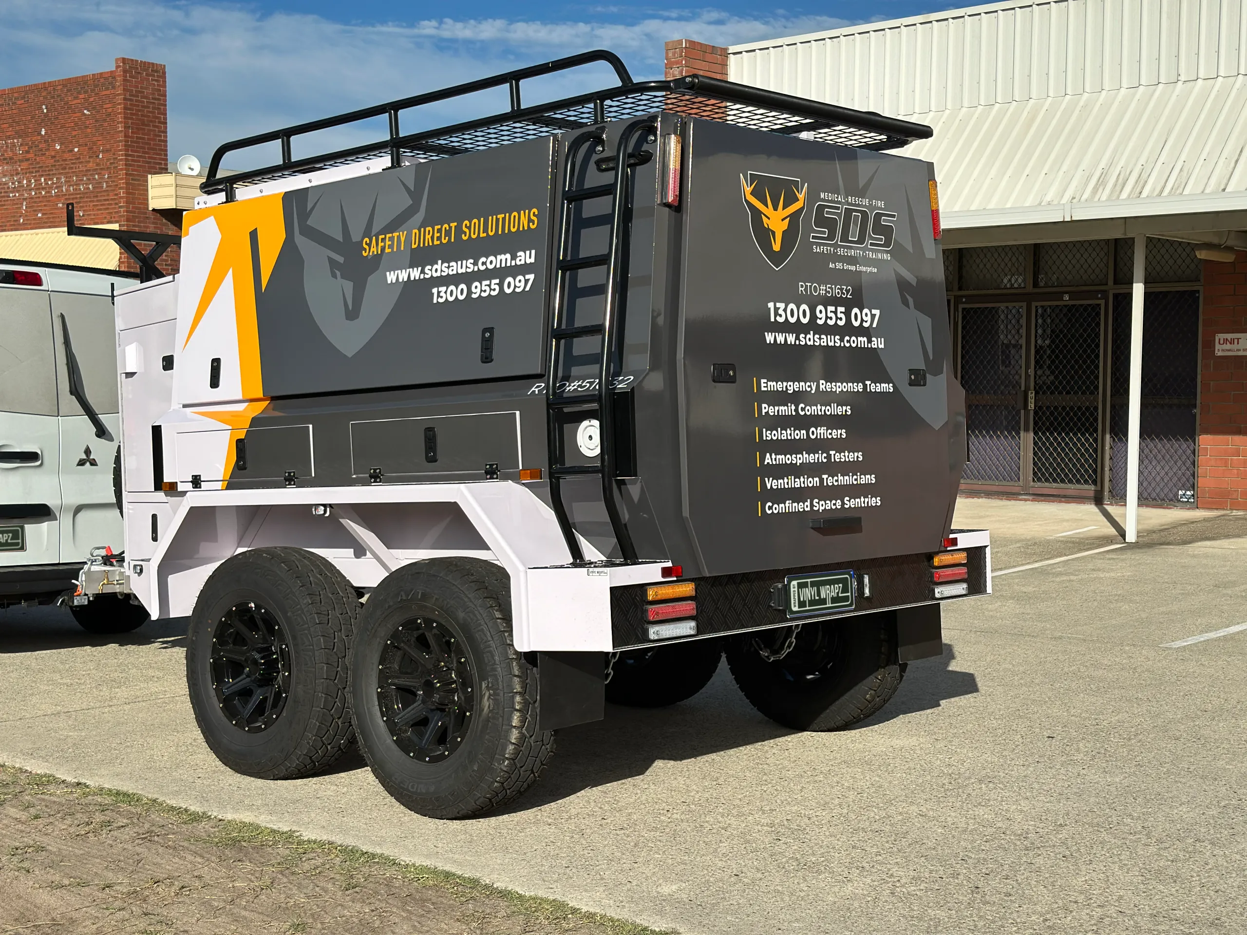 Safety Direct Solutions trailer rear panel and side compartments with matching graphics