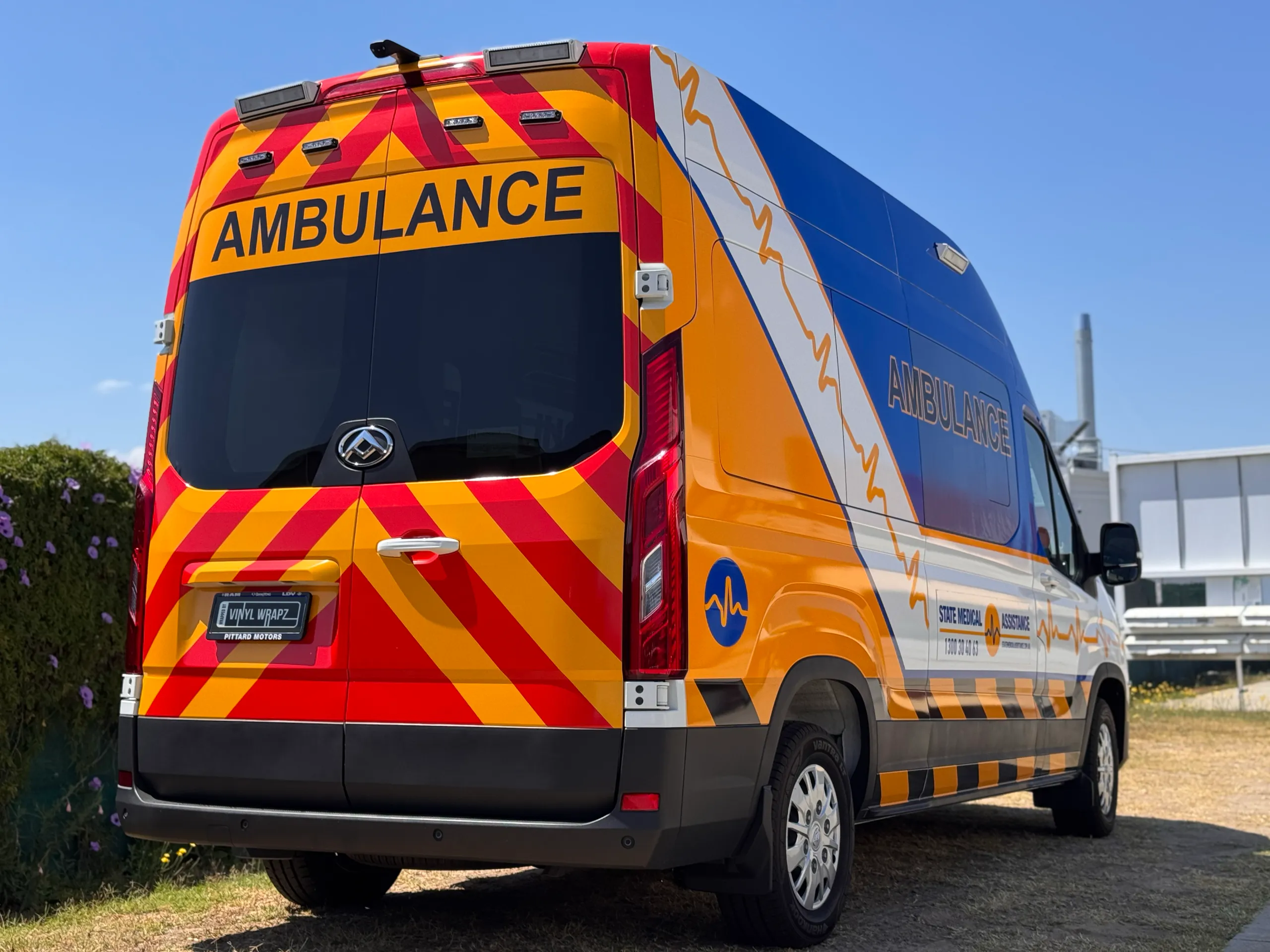 Red and yellow rear chevrons on the State Medical Assistance LDV ambulance