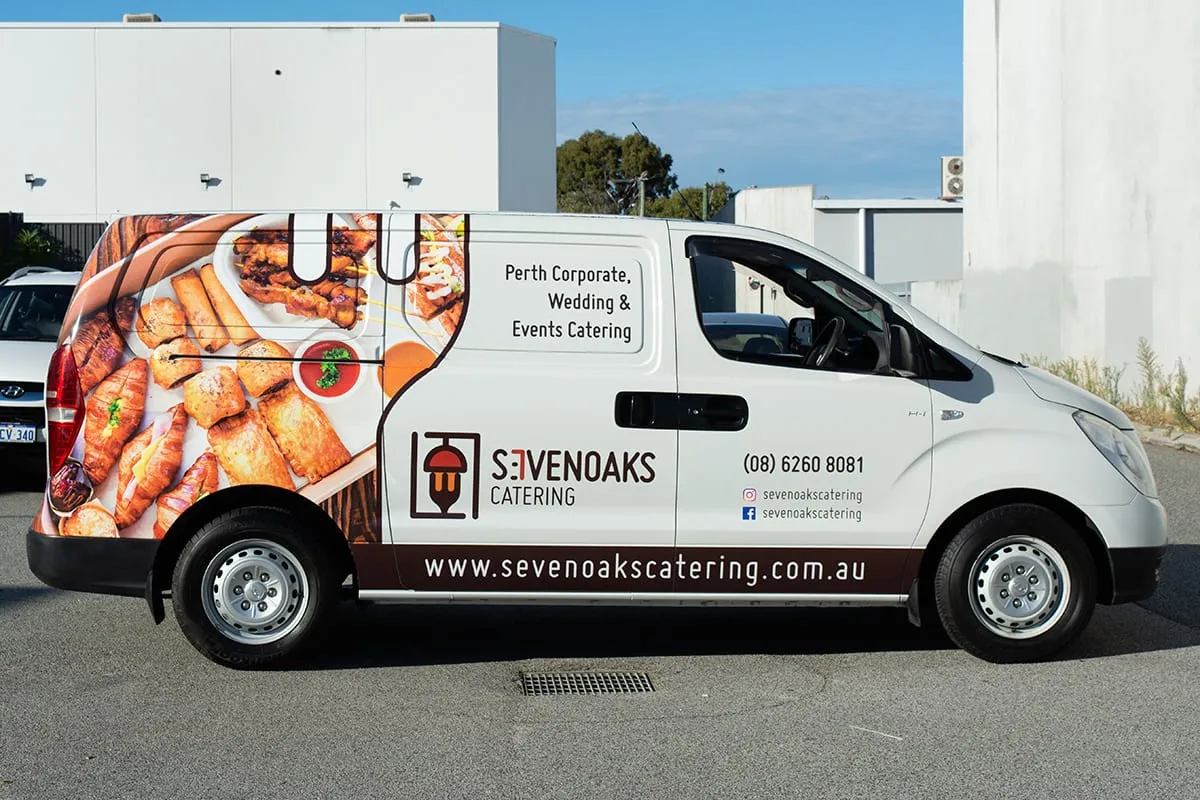 Hyundai iLoad catering van with printed food photography on the rear panels and business details on the doors, wrapped by Vinyl Wrapz