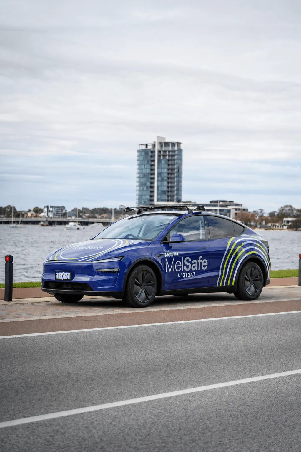City of Melville MelSafe community service Tesla in a purple printed wrap with reflective livery