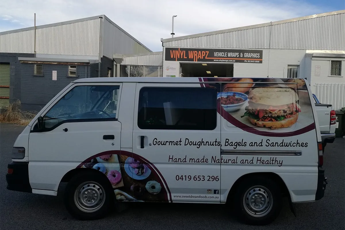 Mitsubishi Express van with printed doughnut and bagel photography and cut lettering, spot graphics by Vinyl Wrapz in Perth