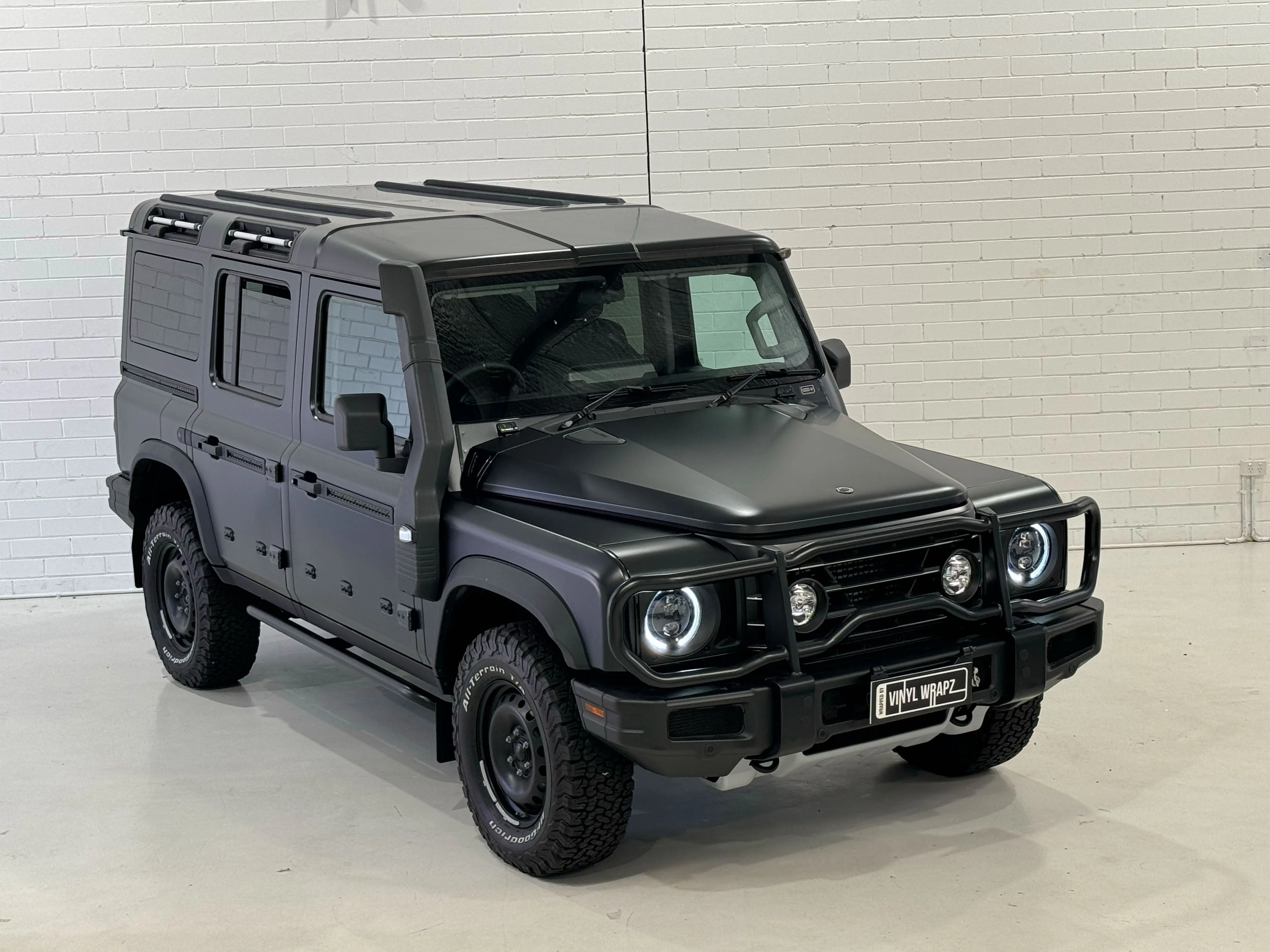 Ineos Grenadier in matte paint protection film inside the Vinyl Wrapz workshop, Osborne Park