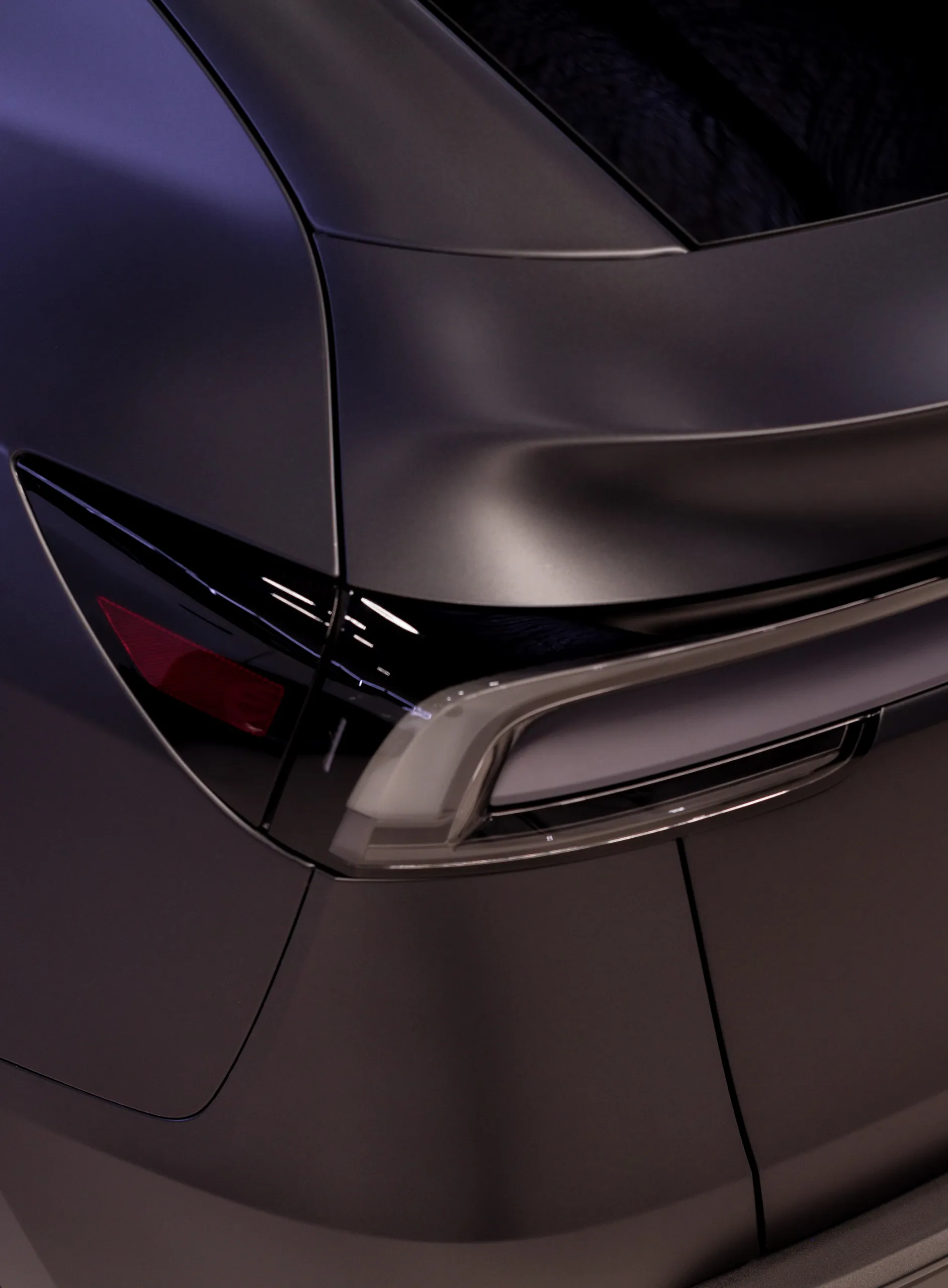 Close-up of the Tesla Model Y satin rear pillar and rear light