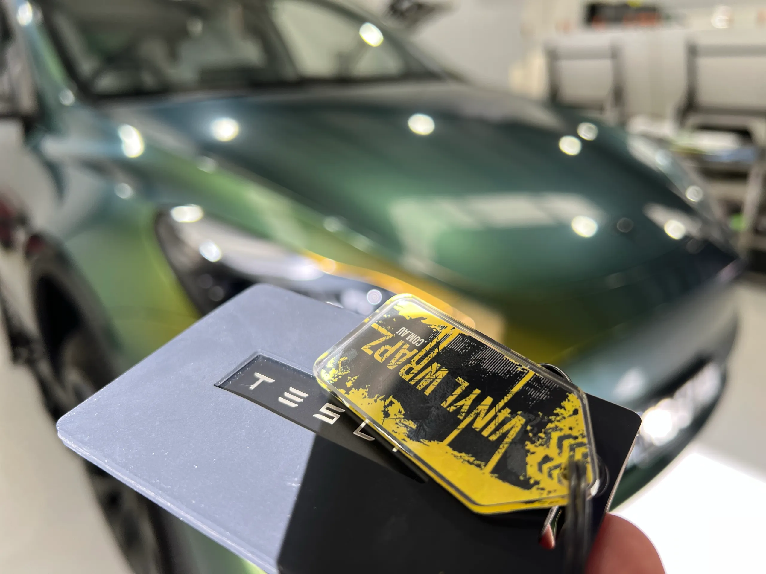 Golden green colour-shift Tesla Model Y, key detail
