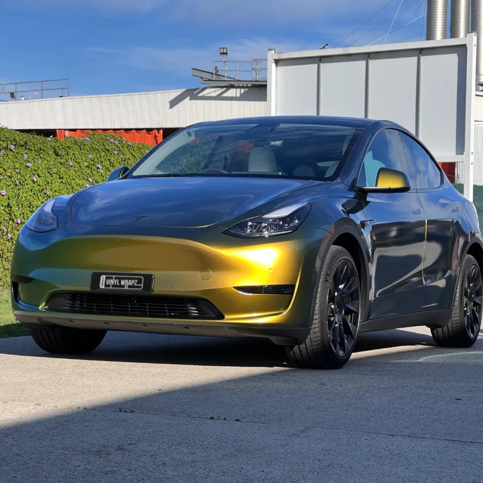 Golden green colour-shift Tesla Model Y, front quarter