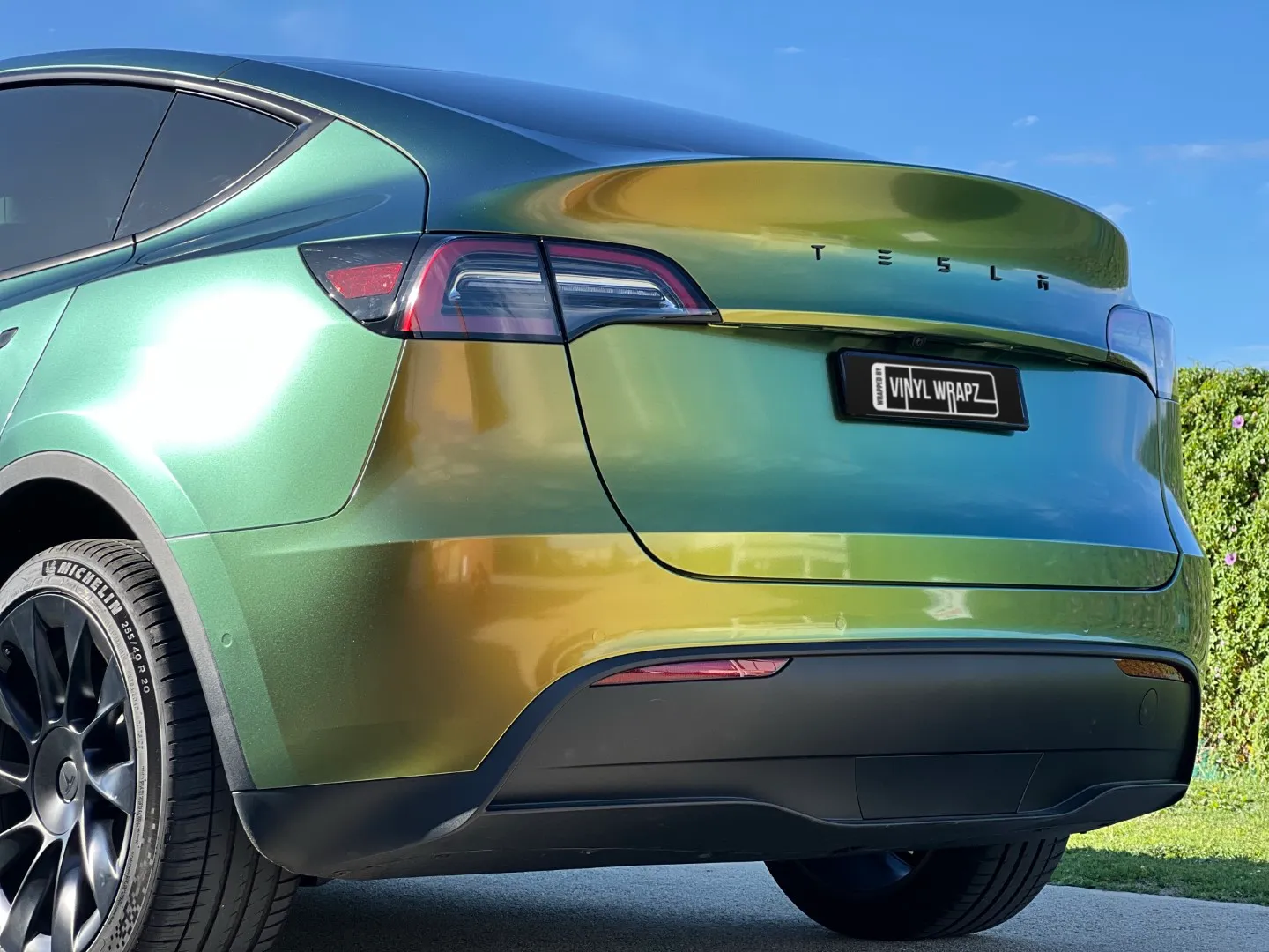 Golden green colour-shift Tesla Model Y, rear detail