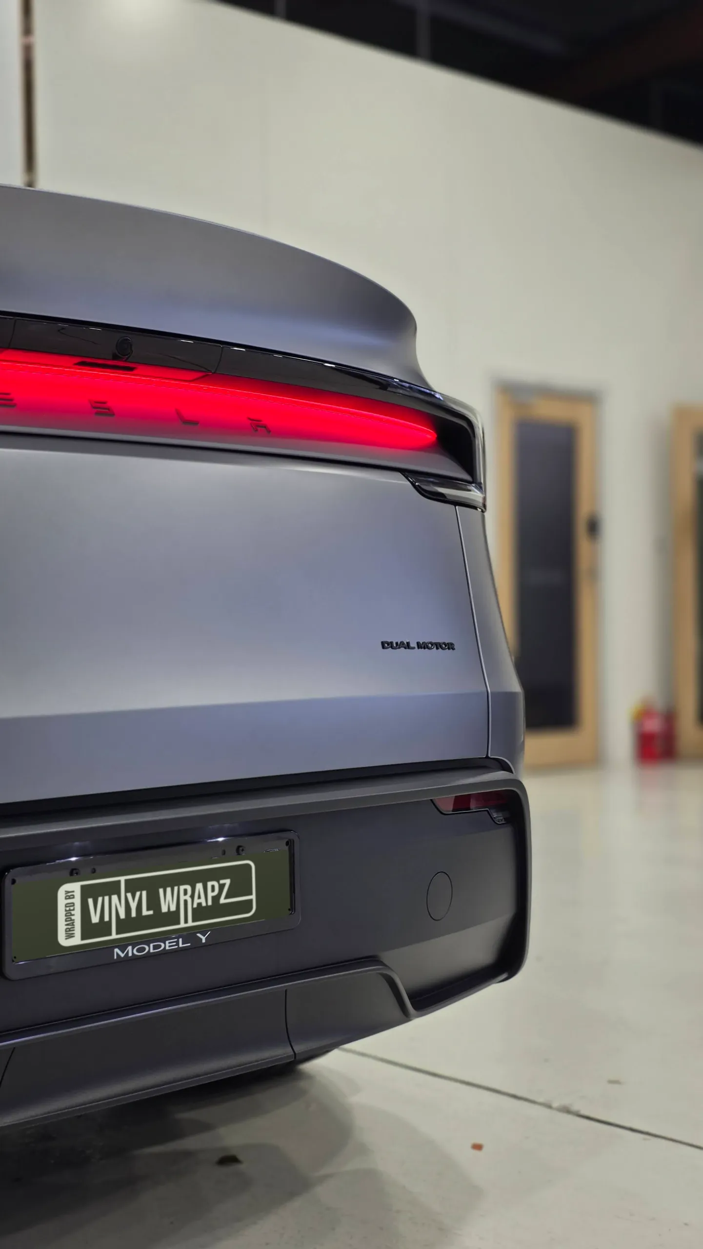 Tesla Model Y rear light bar, tailgate and bumper in satin grey